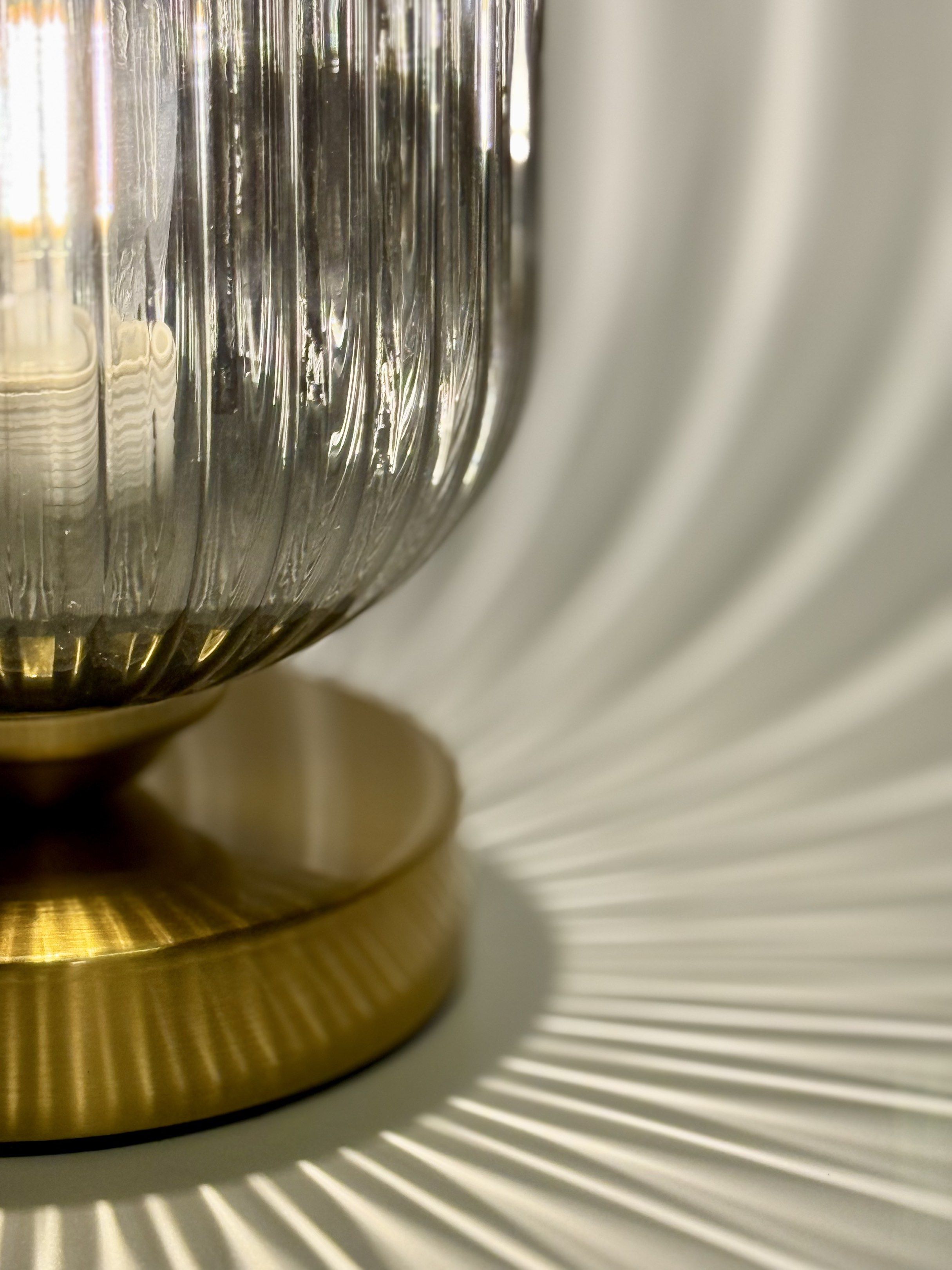Fluted Spectrum Glass Table Lamp (Category: Lighting) located in Manila. Submitted by staylit.ph (Listing ID 1419942505, Image 2). Description: Fluted Spectrum Glass Table Lamp • PhP2,150 (Brand New with Generic Box) • Dimensions: 6in Base x 10.5in Height • Features: Ribbed Glass, Copper Finish Metal Base • Colors: Silver, Gray, Gold • Power Source: Plug-in with Switch (1.6-meter long cord) • Styles: Art Deco, Modern Glam, Mid-Century Modern, Tra