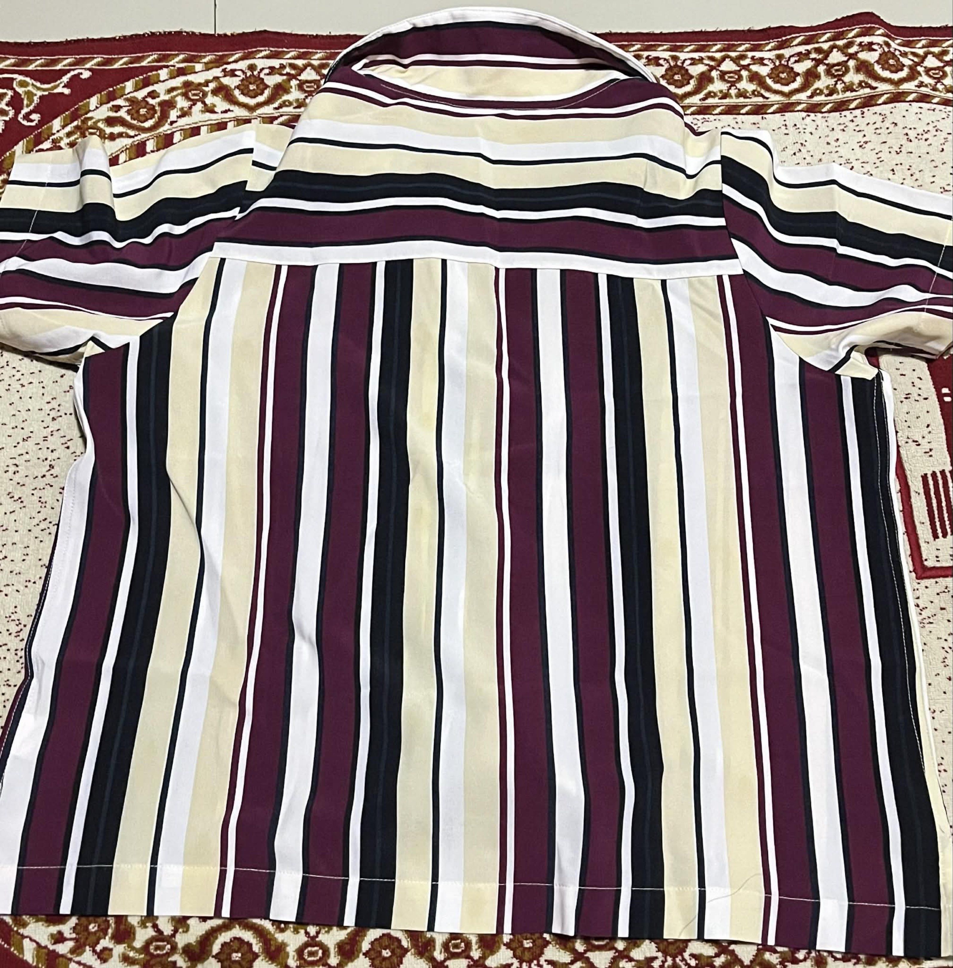 Forme Striped Button-Down Top (Category: Blouses) located in Bacolod City. Submitted by james_andrei (Listing ID 1419961174, Image 2). Description: Price 150 Forme button-down shirt - Size: L (Can fit to M) - Color: Burgundy, black, cream, and white vertical stripes - Features: Short sleeves, classic collar Condition: Used once only Flaws: N/A RFS: Decluttering Mode of Payment: GCash, Bank transfer Mode of Shipping: Jnt Express (SF shouldered by 