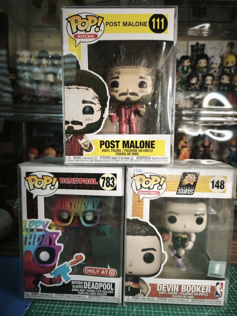 Funko Pop! Post Malone, Deadpool, Devin Booker (Category: Designer & Blind Box Toys) located in Caloocan City. Submitted by clark_20 (Listing ID 1419818284, Image 1). Description: Deadpool - SOLD Devin - 500 Post Malone - SOLD all with protector 9.5/10.