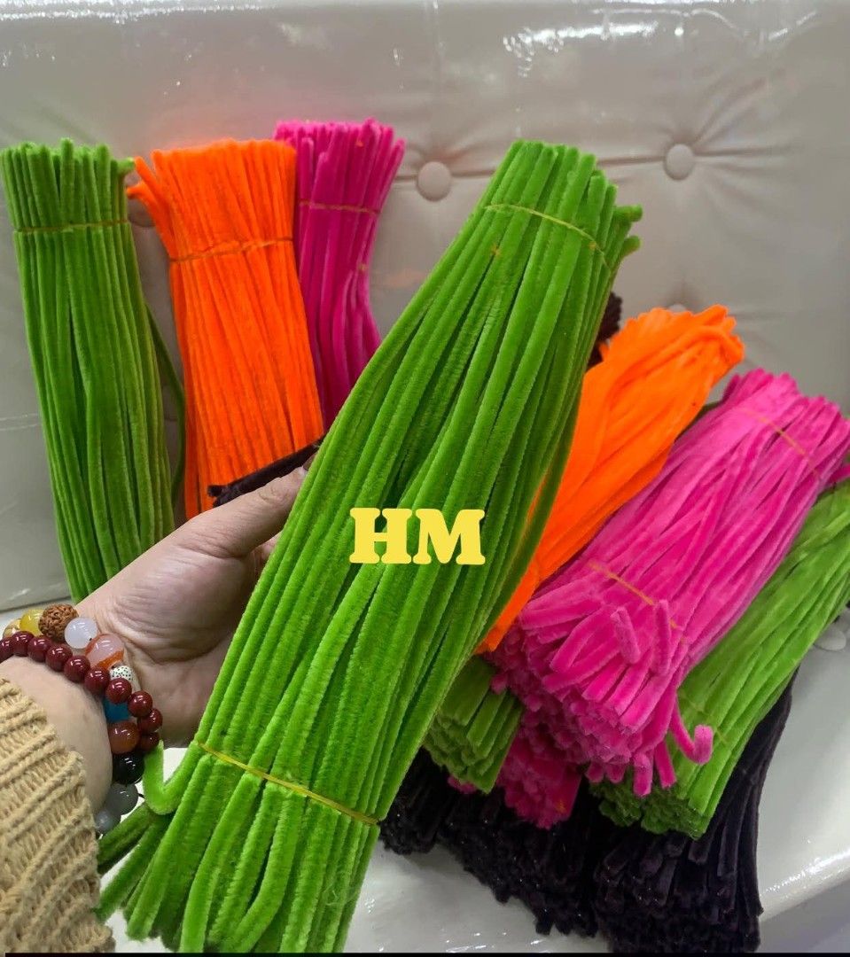 Fuzzy wire 100pcs (Category: Craft Supplies & Tools) located in Manila. Submitted by yzlshop (Listing ID 1419862739, Image 3). Description: - Colorful pipe cleaner bundles - Available colors: green, orange, pink, purple - Perfect for arts and crafts - Tied together for easy use - Suitable for kids and adults - Versatile craft supplies.