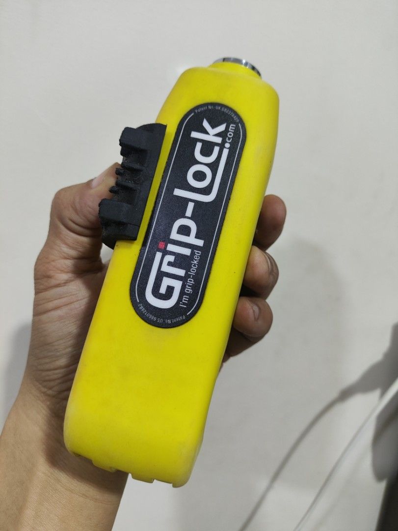 Grip Lock original (motorcycle lock) (Category: Other Motorcycles Parts and Accessories) located in Malabon City. Submitted by CapHero (Listing ID 1419865965, Image 2). Description: nabili ko sya ng 2500 no issue sign of usage lang 1 key.