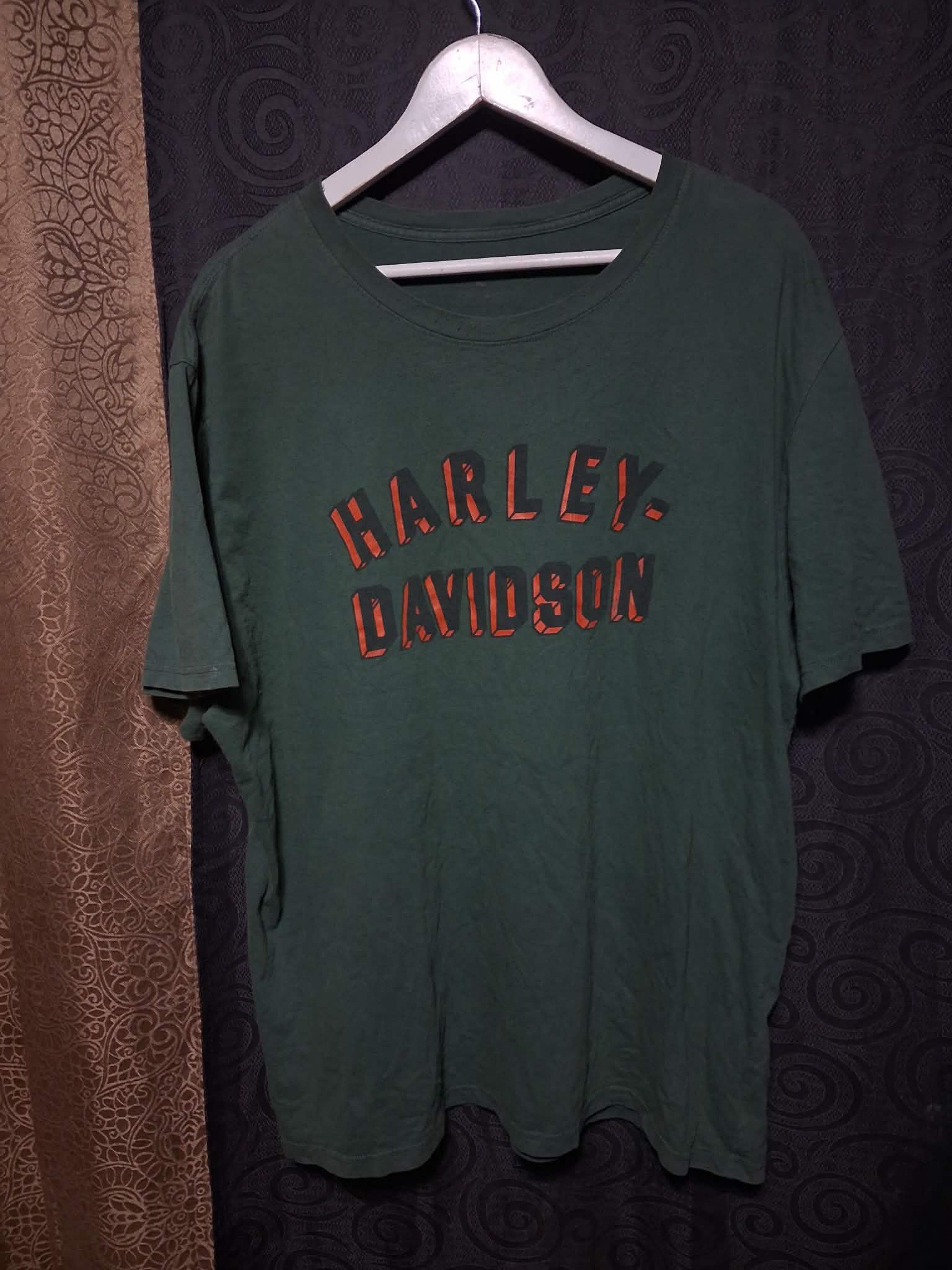 Harley Davidson Green T-Shirt (Category: Tshirts & Polo Shirts ) located in Don Carlos. Submitted by vianjn (Listing ID 1419780336, Image 1). Description: - Green Harley Davidson t-shirt - Orange Harley Davidson logo - Crew neck - Short sleeves - Classic design.
