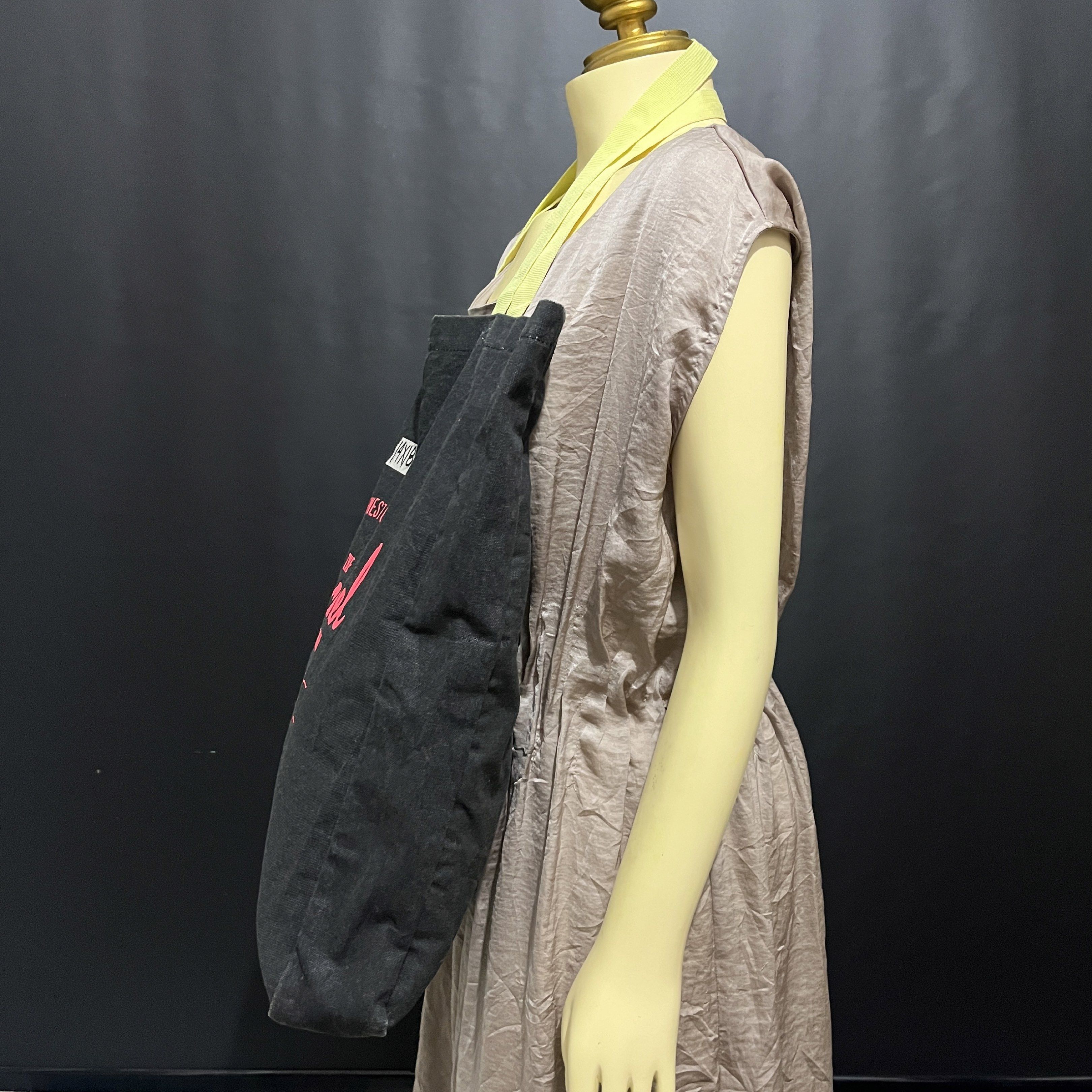 Herschel Supply Co. Tote Bag (Category: Tote Bags) located in Cabadbaran. Submitted by dfgthriftology (Listing ID 1419835490, Image 3). Description: - Herschel Supply Co. tote bag - Color: Black with pink logo - Straps: Yellow - Interior: White - Shape: Rectangular - Features the "WELCOME TO HERSCHEL" tag inside..