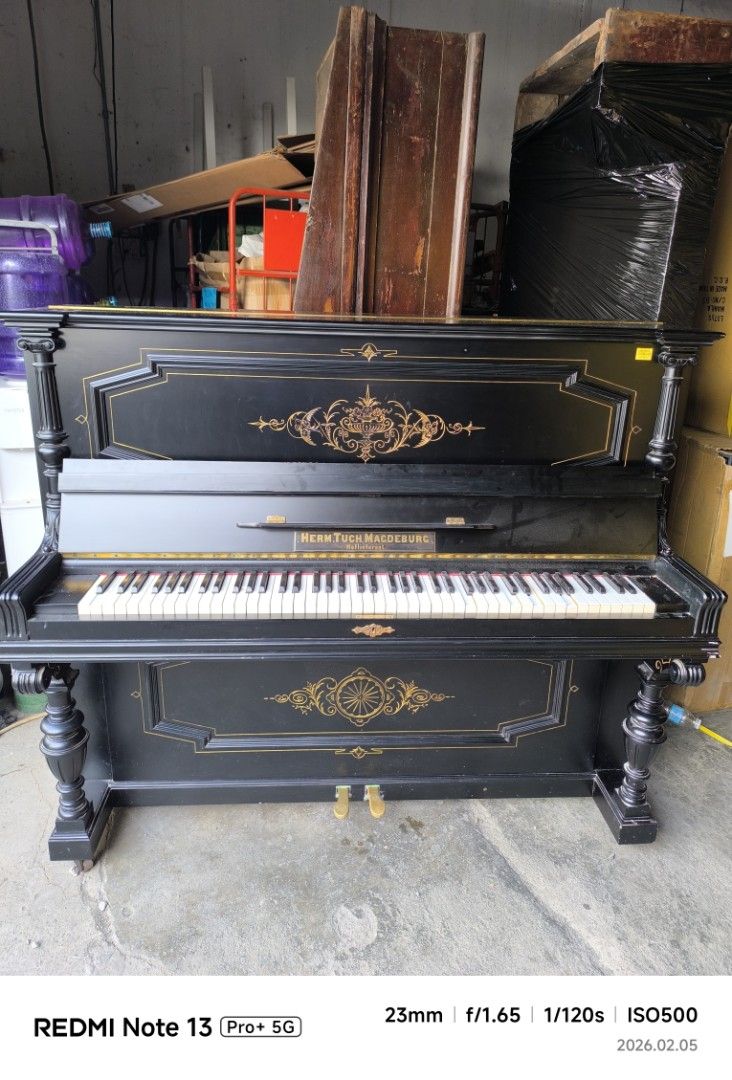 Hoflieferant Piano - Black (Category: Musical Instruments) located in Dasmarinas. Submitted by bossgabo (Listing ID 1419852826, Image 3). Description: - Elegant black piano - Full keyboard with white and black keys - Decorative gold accents - Classic design with ornate legs and detailing - Features two pedals.