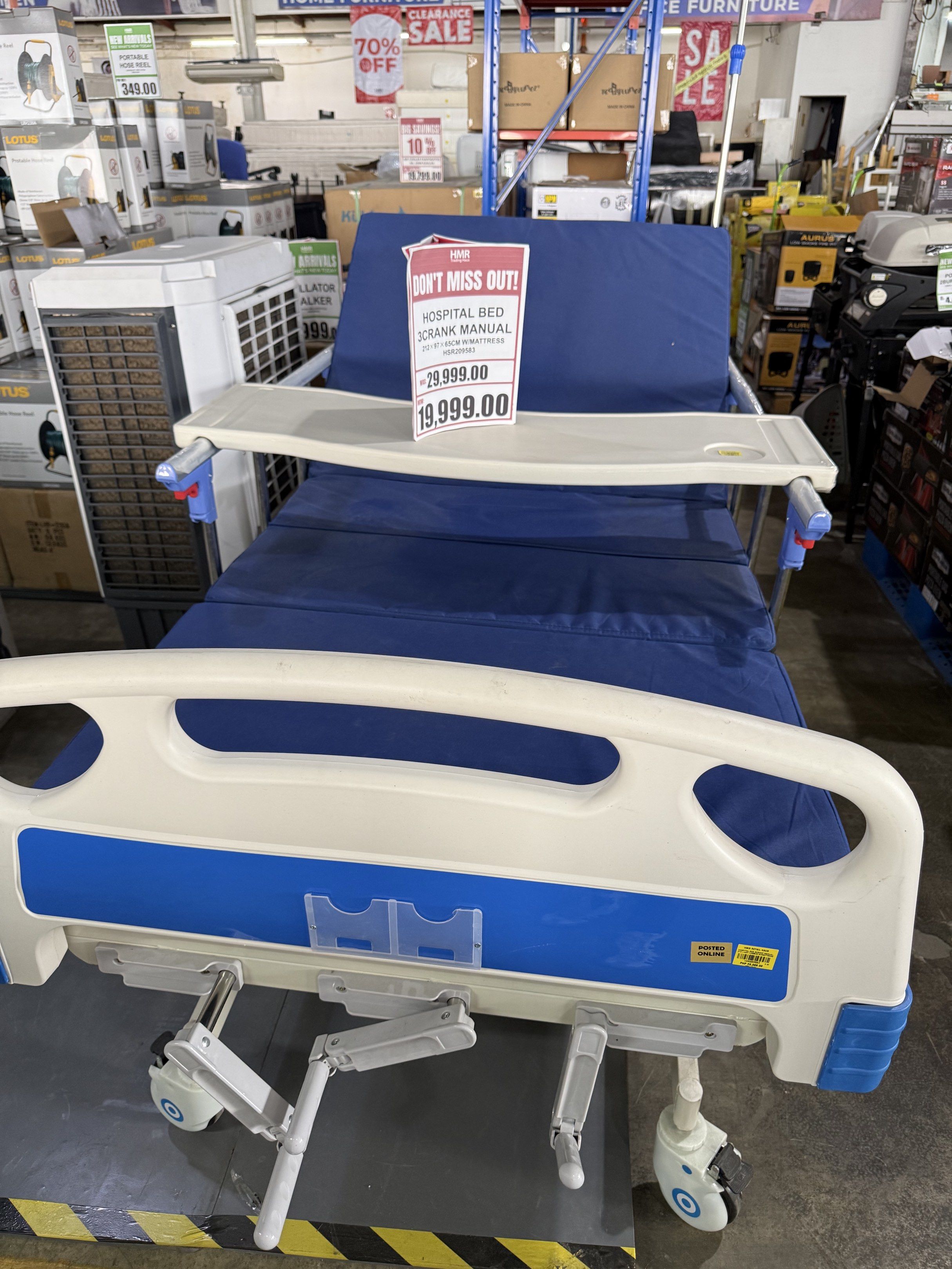 Hospital Bed Crank Manual (Category: Medical Supplies & Tools) located in Manila. Submitted by joylontok16 (Listing ID 1419937254, Image 1). Description: Hospital bed with 3crank manual. Includes a side table. The original price was ₱29,999.00, now on sale for ₱19,999.00. Features a blue mattress and white and blue frame. Includes wheels for easy movement..