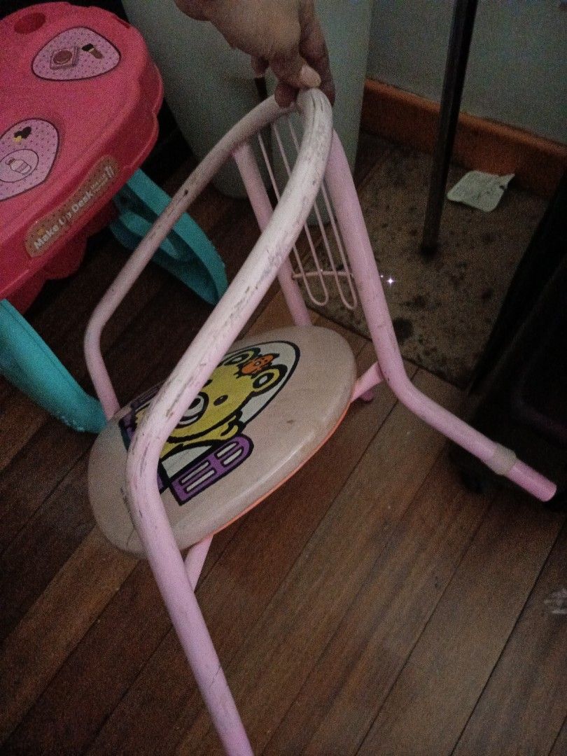 Kids' Makeup Desk with Chair (Category: Kids Tables & Chairs) located in Manila. Submitted by christcels78475 (Listing ID 1419812612, Image 3). Description: Kids' makeup desk comes with a matching chair. The desk is pink with a heart-shaped design and has a built-in mirror. The chair has a cartoon character on the seat. The desk has blue legs. It is a fun set for kids to play with..