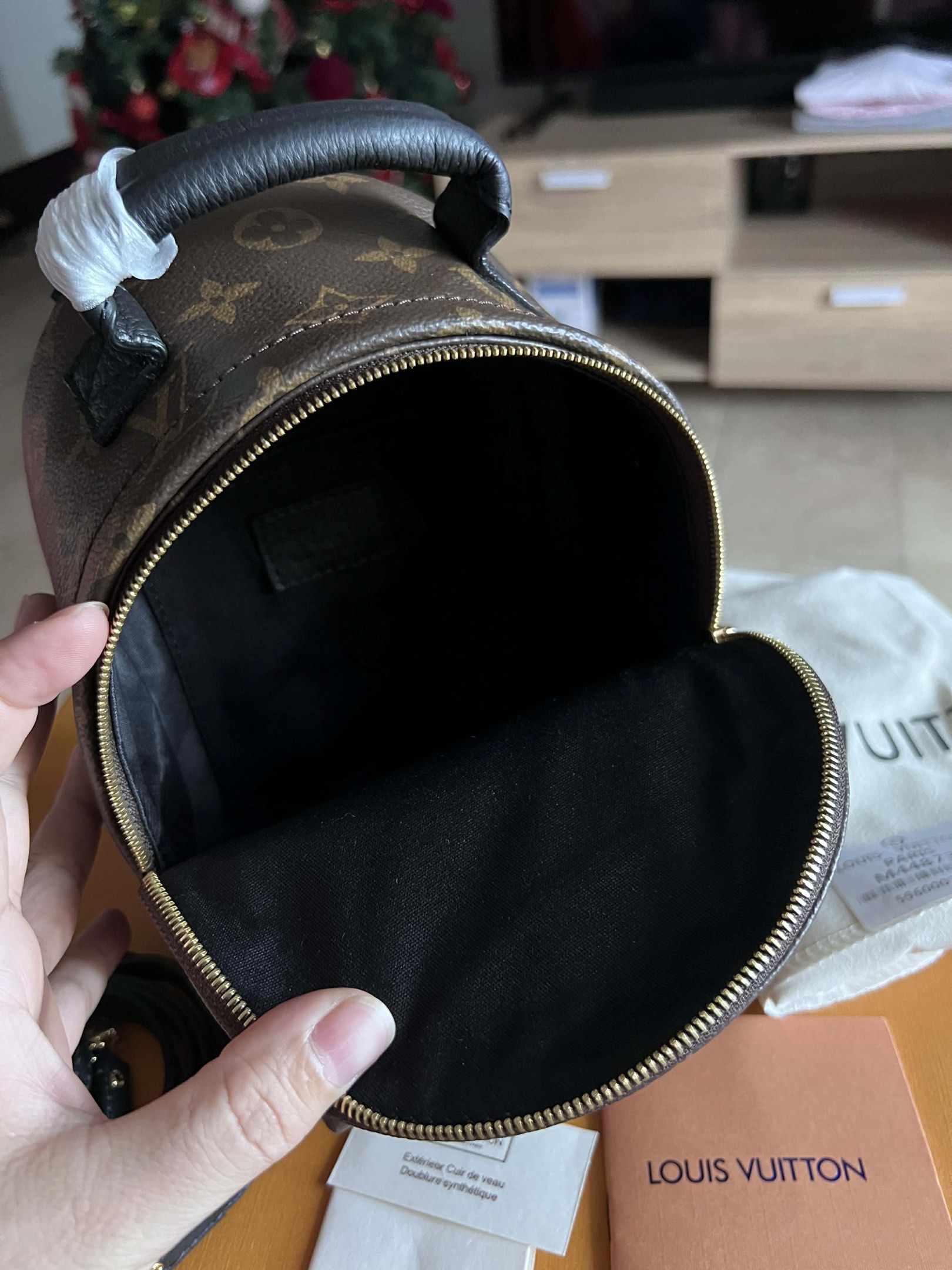 Louis Vuitton Palm Springs Mini Backpack (Category: Luxury Bags & Wallets) located in Manila. Submitted by luxurytreasure.ph (Listing ID 1419944738, Image 3). Description: - Louis Vuitton Palm Springs Mini Backpack - Iconic monogram canvas - Top handle and adjustable shoulder straps - Includes dust bag, care booklet, and original box - Dark fabric interior lining - Front pocket - Gold-tone hardware - Ideal for everyday wear.