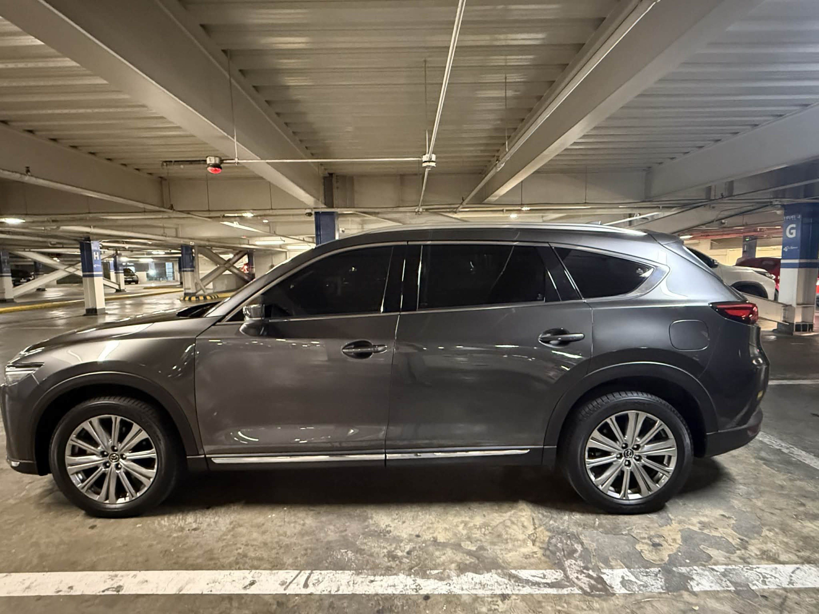 Mazda CX-8 Exclusive Auto (Category: Used Cars) located in Manila. Submitted by ennui242526 (Listing ID 1419966360, Image 2). Description: Mazda CX-8 Exclusive (6-seater) REFRESHED/UPDATED VERSION - Top of the Line - All Stock - Machine Gray - Nappa Leather interior with Rosewood trims. - Updated Front Grille (Mesh instead of Horizontal Slats like the other CX-8’s in the market) - Removed Blueray disc slot (outdated tech; other CX-8’s in the mark
