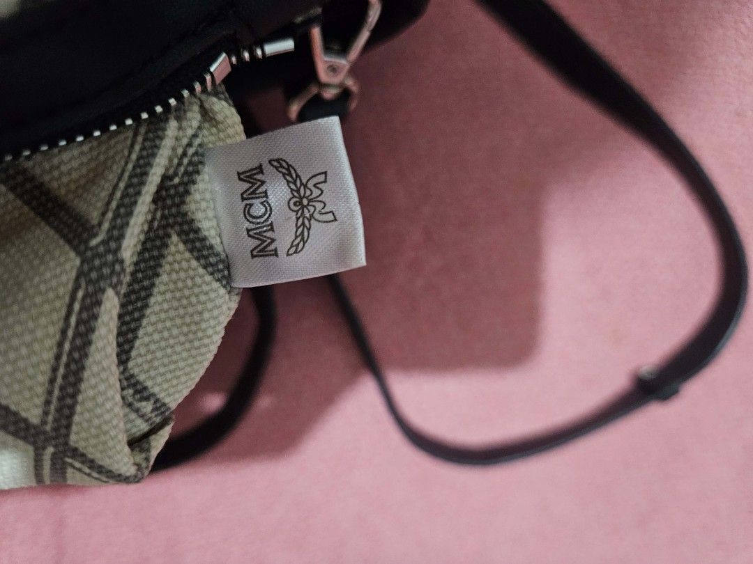 MCM Mini Toni top-zip shopper tote (Category: Luxury Bags & Wallets) located in Quezon City. Submitted by finding.a.second.home (Listing ID 1419958868, Image 3). Description: - NGA MCM -SOURCED FROM KOREA - Detachable shoulder strap - Exterior: MCM logo pattern - Interior: MCM logo patterned lining - YKK ZIP - WITH ETIKETA -RATING 9/10 -.