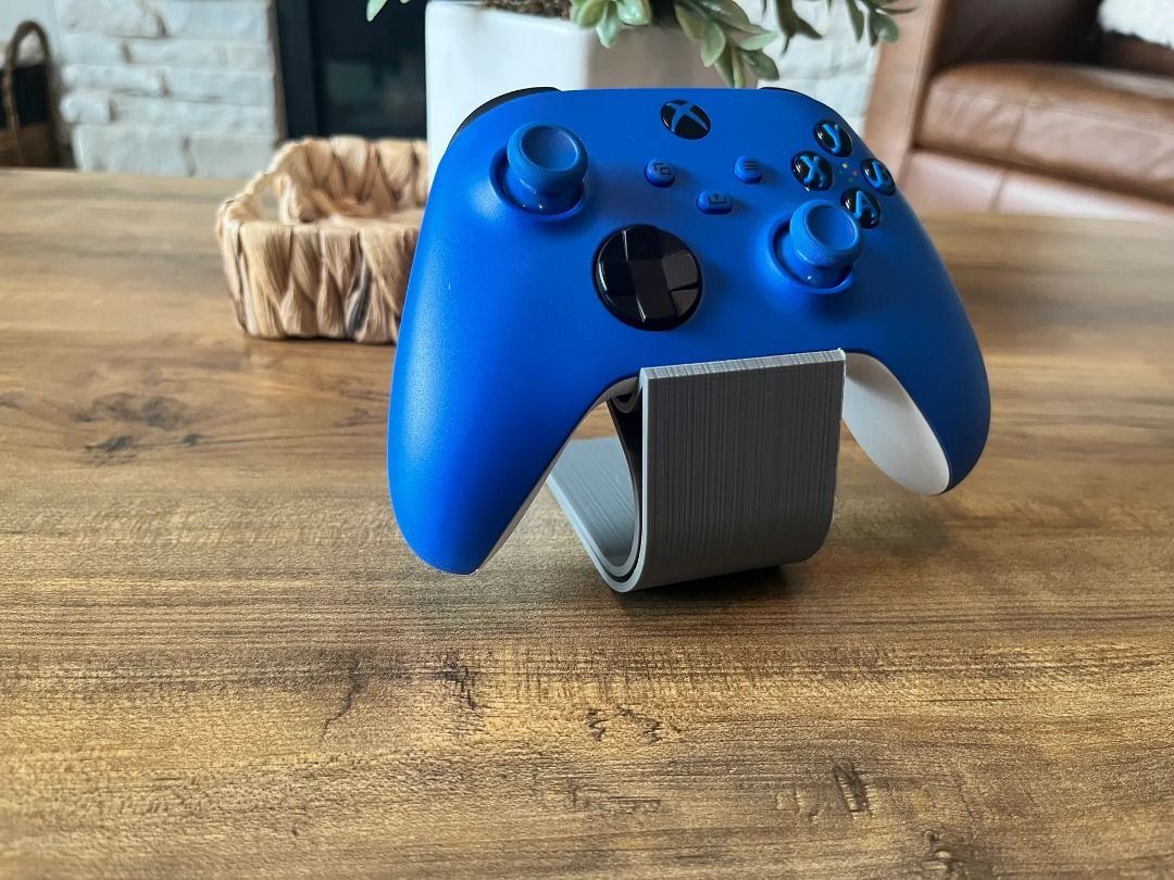 Minimalist Game Controller Stand | Desk Display Holder (Category: Cases & Covers) located in Mandaluyong City. Submitted by heyitslaaaance (Listing ID 1419828157, Image 1). Description: Upgrade your gaming setup with this Universal Controller Stand, built for a clean, premium look while securely holding your favorite game controllers. 🔹 Fits All Major Controllers Xbox Controllers PlayStation (PS4 / PS5) Controllers Nintendo Switch Pro Controller