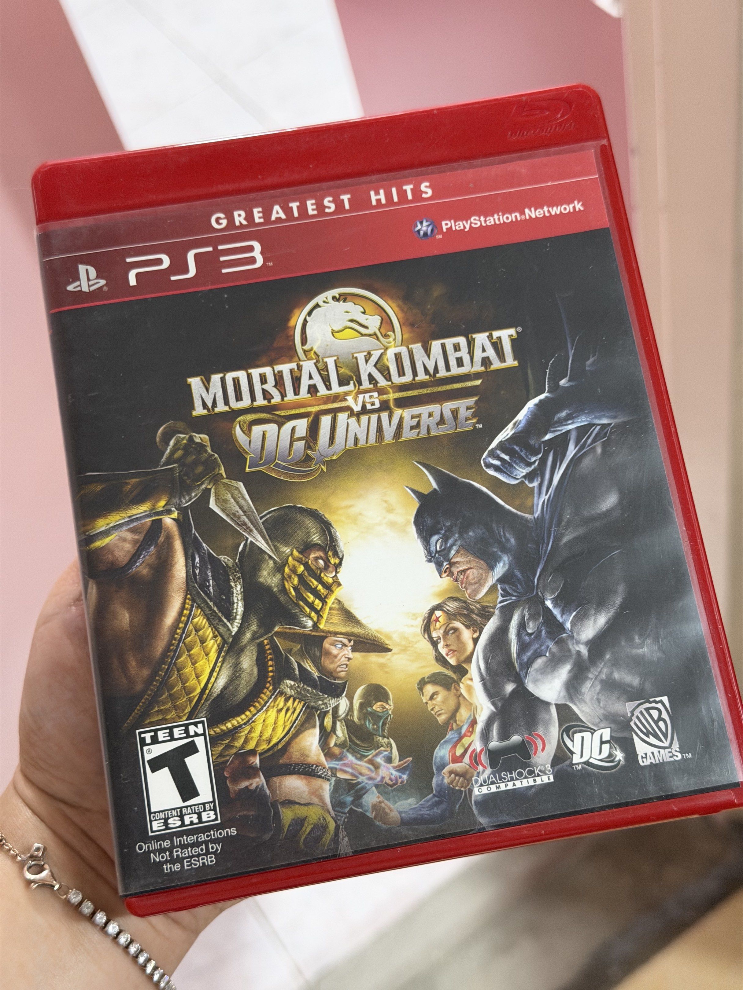 Mortal Kombat vs DC Universe PS3 Game (Category: PlayStation) located in Mabalacat. Submitted by christinnemae (Listing ID 1419960651, Image 1). Description: - Mortal Kombat vs DC Universe for PlayStation 3 - Features iconic characters from Mortal Kombat and DC Universe - Includes the game disc and instruction manual - Rated T for Teen - Offers multiplayer gameplay - Features leaderboards, lobbies, and matchmaking - Includes trophies - Features s