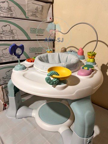 Multi-Functional Activity Center with Bouncer (Category: Infant Playtime) located in Manila. Submitted by airacruz0048042 (Listing ID 1419946291, Image 2). Description: - Multi-functional baby activity center - Features a bouncer and various toys - Includes a play area with colorful toys - Has a bead maze - Comes with a comfortable seat - Designed with a stable base - Brand new and ready to use.