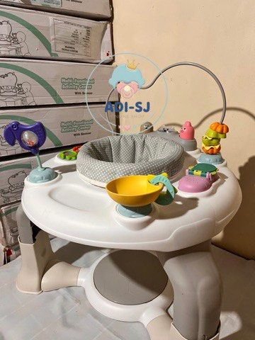 Multi-Functional Activity Center with Bouncer (Category: Infant Playtime) located in Manila. Submitted by airacruz0048042 (Listing ID 1419946291, Image 3). Description: - Multi-functional baby activity center - Features a bouncer and various toys - Includes a play area with colorful toys - Has a bead maze - Comes with a comfortable seat - Designed with a stable base - Brand new and ready to use.