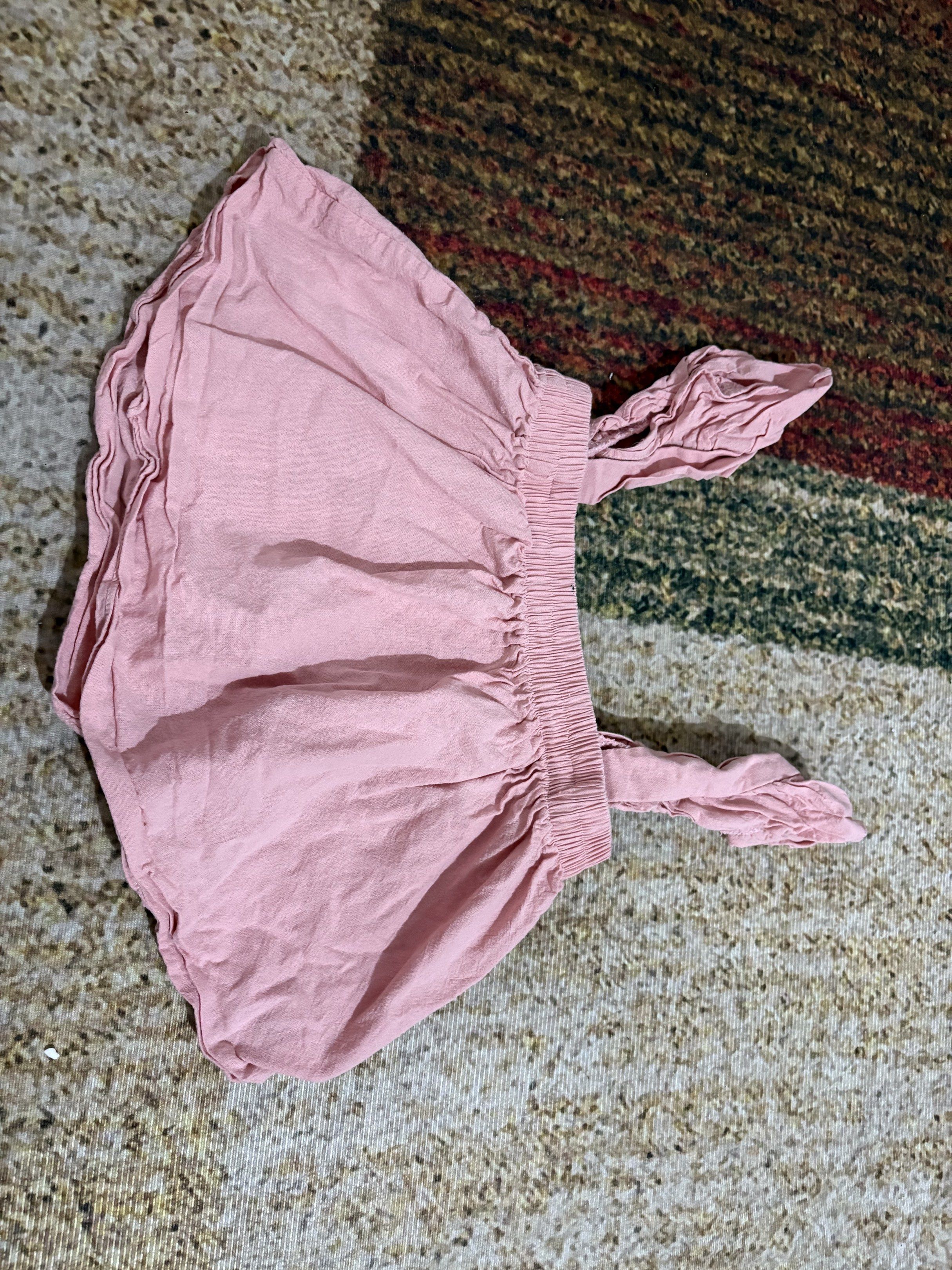 NAKD Fashion Ruffle Sleeves Top (Category: Blouses) located in Makati City. Submitted by asphh (Listing ID 1419906480, Image 1). Description: - Square neckline - Ruffle sleeves - Light pink color - Elastic waistband - Tie details on sides - Cotton linen material.