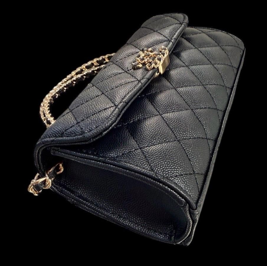 ON HAND Black Quilted Handbag with Chain (Category: Luxury Bags & Wallets) located in General Trias. Submitted by godgraceisreal_ph (Listing ID 1419854878, Image 2). Description: ON HAND, 2 piece available READY TO SHIP VIA LALAMOVE, LBC Complimentary Chanel VIP gift wallet on chain -Black quilted wallet on chain handbag - Gold chain strap - Gold Chanel logo - Flap closure - Leather material - Top handle - Long chain strap (shoulder/crossbody).