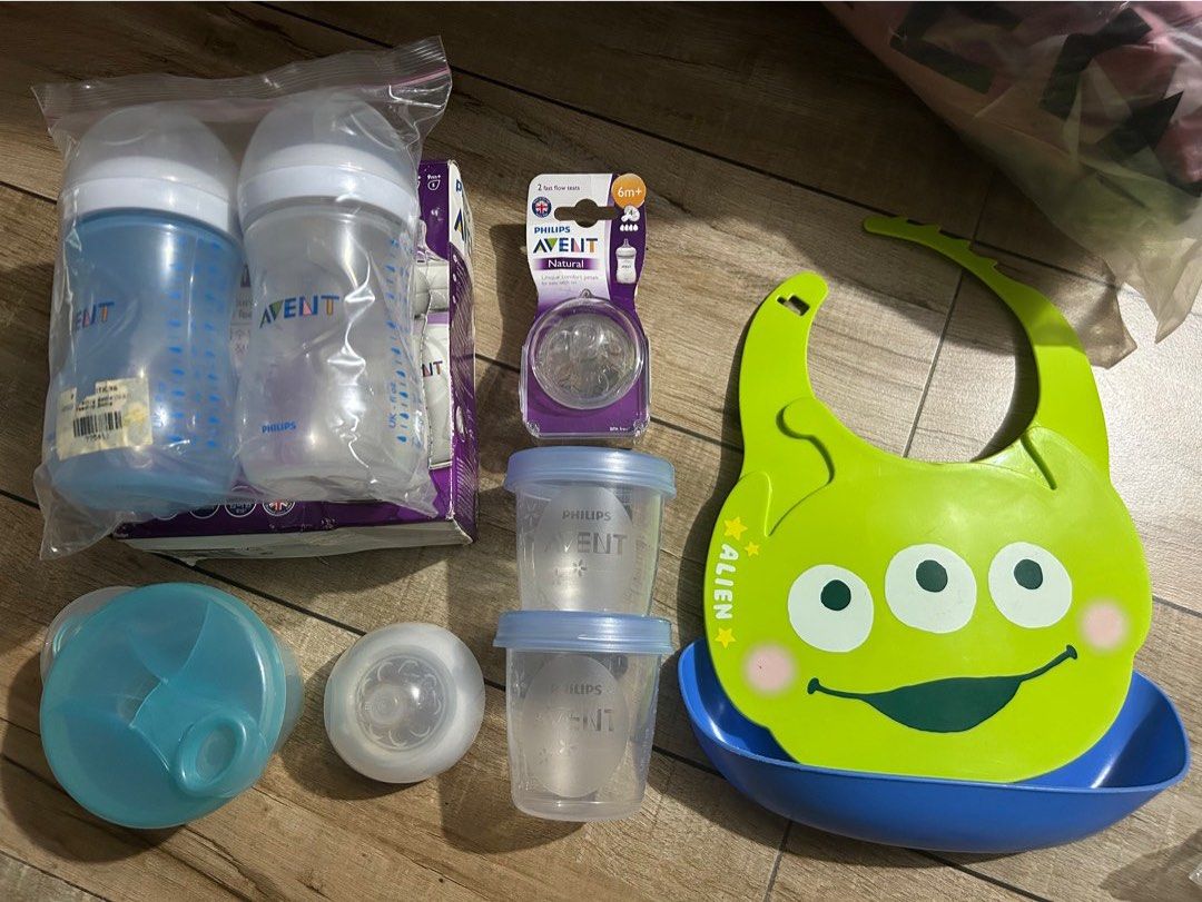 Philips Avent Baby Bottles and Accessories (Category: Breastfeeding & Bottle Feeding) located in Paranaque City. Submitted by zac.sei (Listing ID 1413094072, Image 1). Description: brandnew 2pcs 9os 1m+ bottle feed 2pcs breast milk storage cup 2pcs 6m+ teats extra bottle cover with 1m+ teat freebie pre loved avent milk powder dispenser pre loved disney pixar plastic bib.