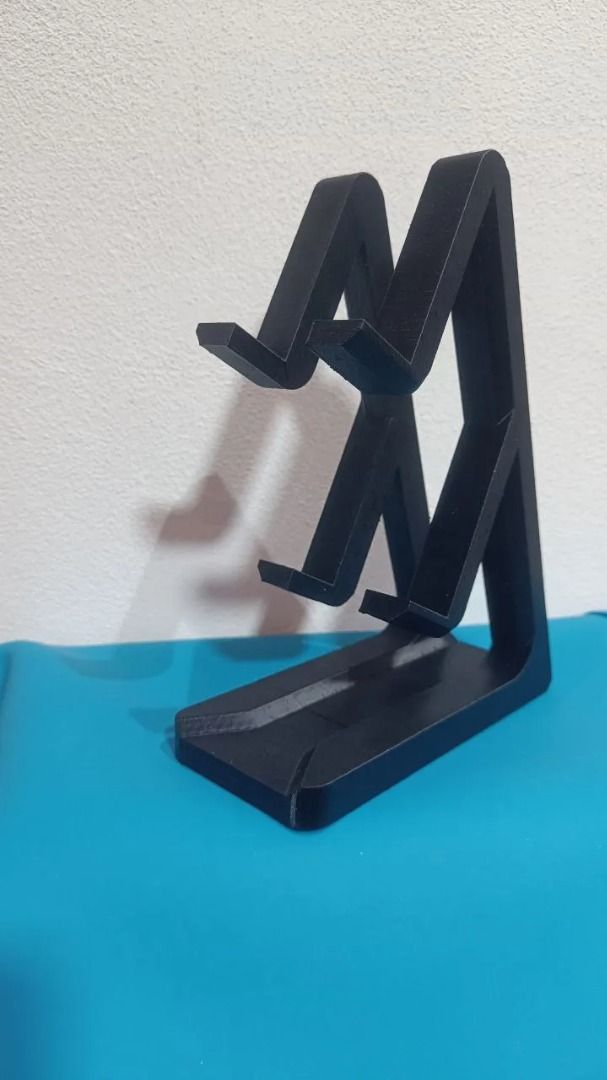 PlayStation Controller Stand | Fits PS4 & PS5 | Double Slot (Category: Cases & Covers) located in Mandaluyong City. Submitted by heyitslaaaance (Listing ID 1419826763, Image 3). Description: Upgrade your gaming setup with this PS4 & PS5 Dual Controller Stand! Designed to hold two controllers securely—perfect for keeping your desk or entertainment area neat, organized, and stylish. 🔹 Features Compatible with both PS4 and PS5 controllers Dual-slot