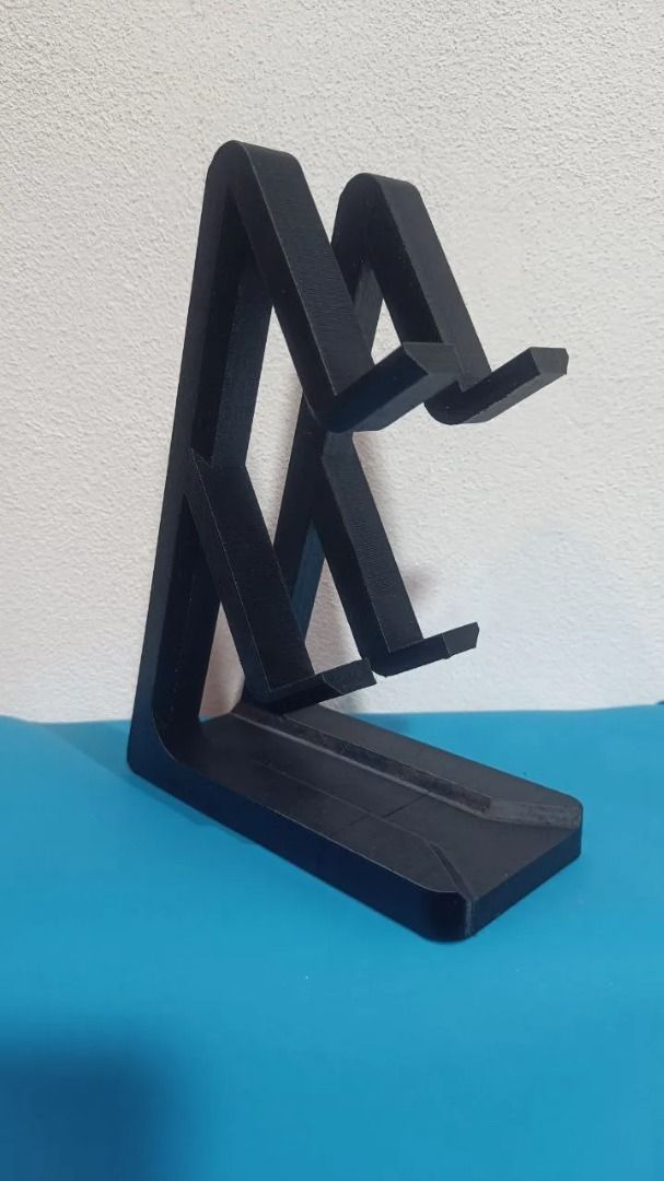 PlayStation Controller Stand | Fits PS4 & PS5 | Double Slot (Category: Cases & Covers) located in Mandaluyong City. Submitted by heyitslaaaance (Listing ID 1419826763, Image 2). Description: Upgrade your gaming setup with this PS4 & PS5 Dual Controller Stand! Designed to hold two controllers securely—perfect for keeping your desk or entertainment area neat, organized, and stylish. 🔹 Features Compatible with both PS4 and PS5 controllers Dual-slot