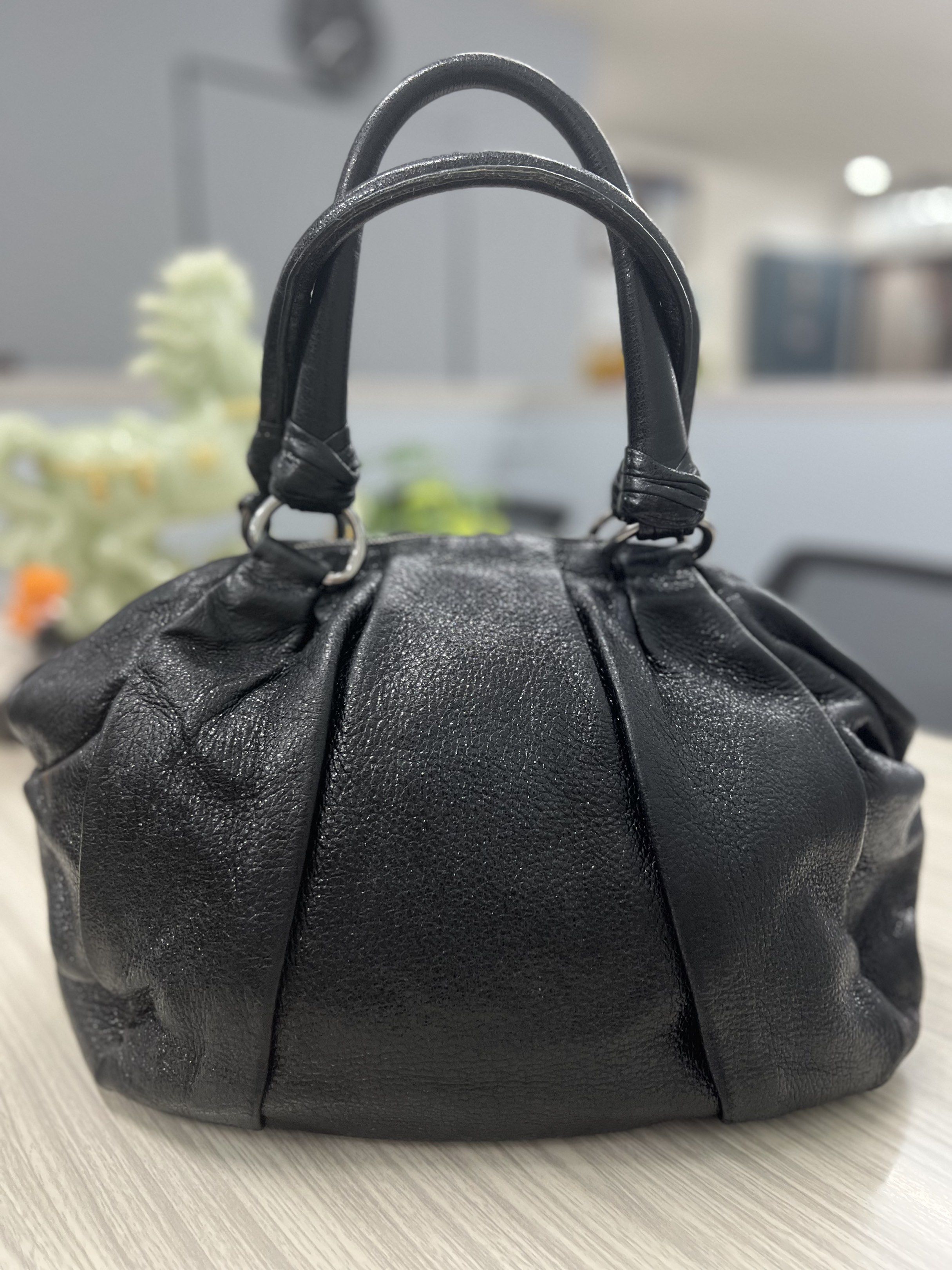 Prada Black Vitello Daino Leather Handbag (Category: Luxury Bags & Wallets) located in Cagayan de Oro. Submitted by riggstuffs (Listing ID 1419891823, Image 2). Description: ➡️ Guaranteed Authentic Prada Vitello Daino Handbag ➡️ With white tag ➡️ Exterior and interior areas are in good condition ➡️ No long sling ➡️ Dimension: H12”x L 17”, Handle drop 7” Disclaimer: Riggstuffs is not associated or affiliated with the brand posted. All copyrights a