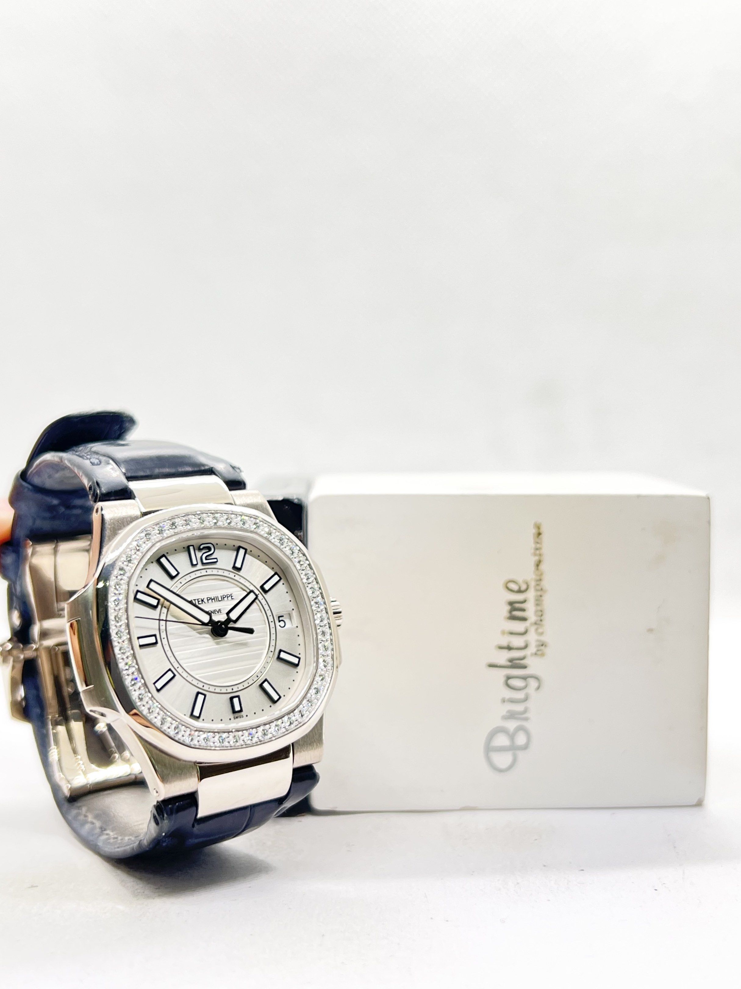 Pre Owned Patek Philippe Nautilus 7010G-001 Silver Dial Quartz White Gold Casing Leather ( Apr 14 ) (Category: Watches) located in Singapore. Submitted by brightime (Listing ID 1419897136, Image 3). Description: Pre Owned Patek Philippe Nautilus 7010G-001 Silver Dial Quartz White Gold Casing Leather ( Apr 14 ) ** Pre-Owned ** ** Mint Condition ** Model : 7010G-001 Also known as : Nautilus Case size : 32mm Dial : Silver Dial With Luminous Baton Nu
