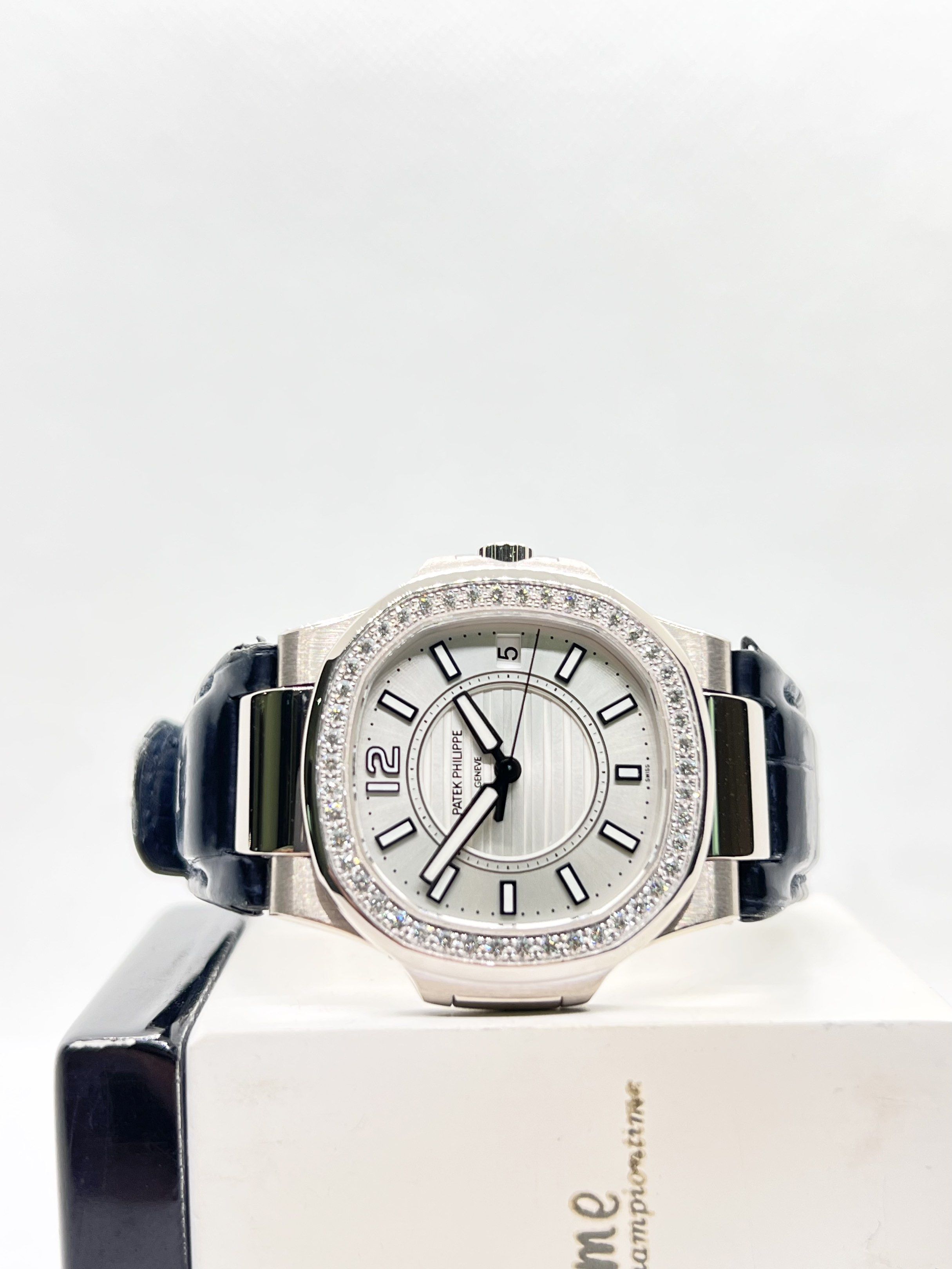 Pre Owned Patek Philippe Nautilus 7010G-001 Silver Dial Quartz White Gold Casing Leather ( Apr 14 ) (Category: Watches) located in Singapore. Submitted by brightime (Listing ID 1419897136, Image 1). Description: Pre Owned Patek Philippe Nautilus 7010G-001 Silver Dial Quartz White Gold Casing Leather ( Apr 14 ) ** Pre-Owned ** ** Mint Condition ** Model : 7010G-001 Also known as : Nautilus Case size : 32mm Dial : Silver Dial With Luminous Baton Nu