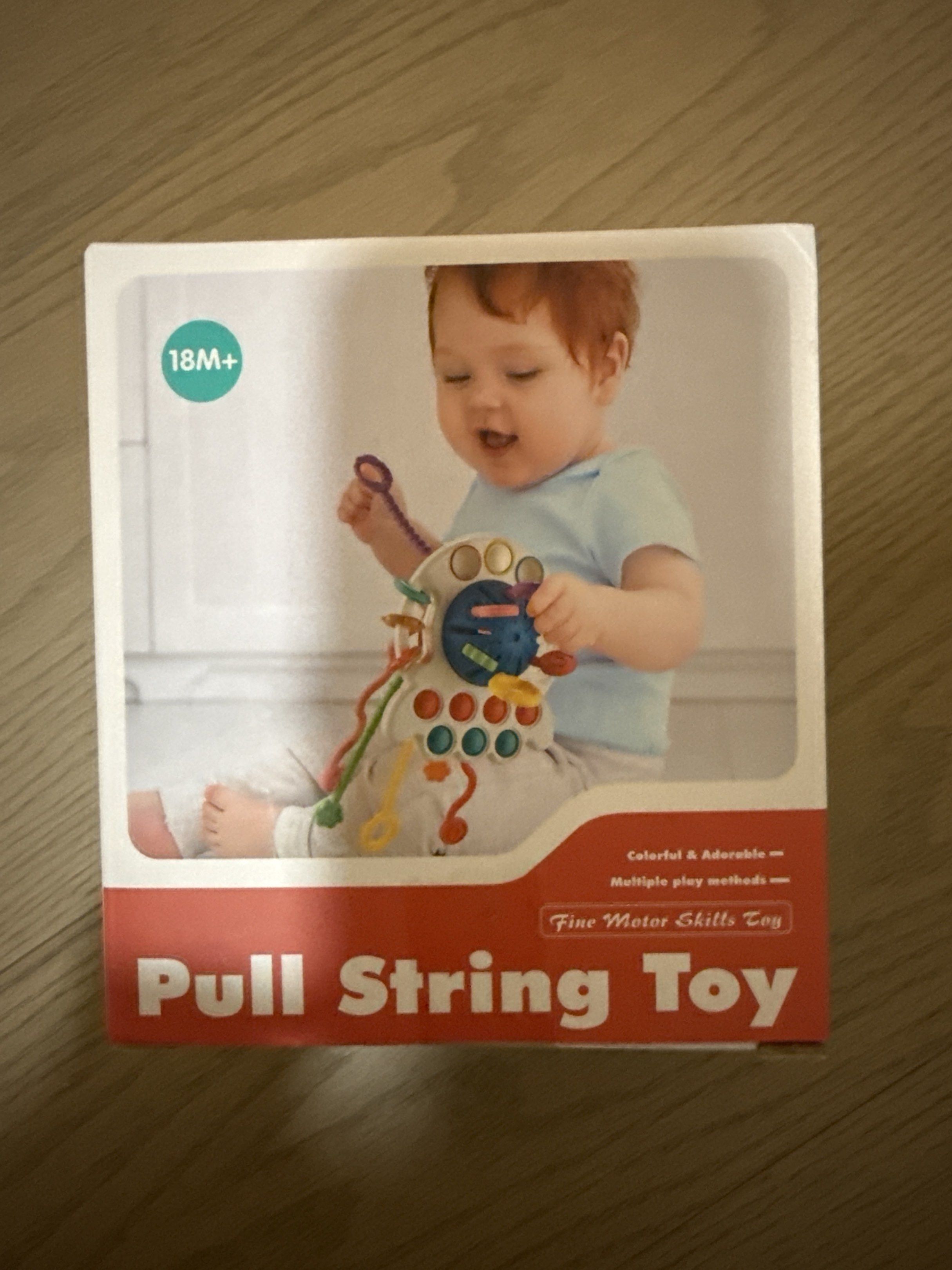 Pull string toy (Category: Infant Playtime) located in Singapore. Submitted by ommphh (Listing ID 1419936185, Image 1). Description: Brand new.