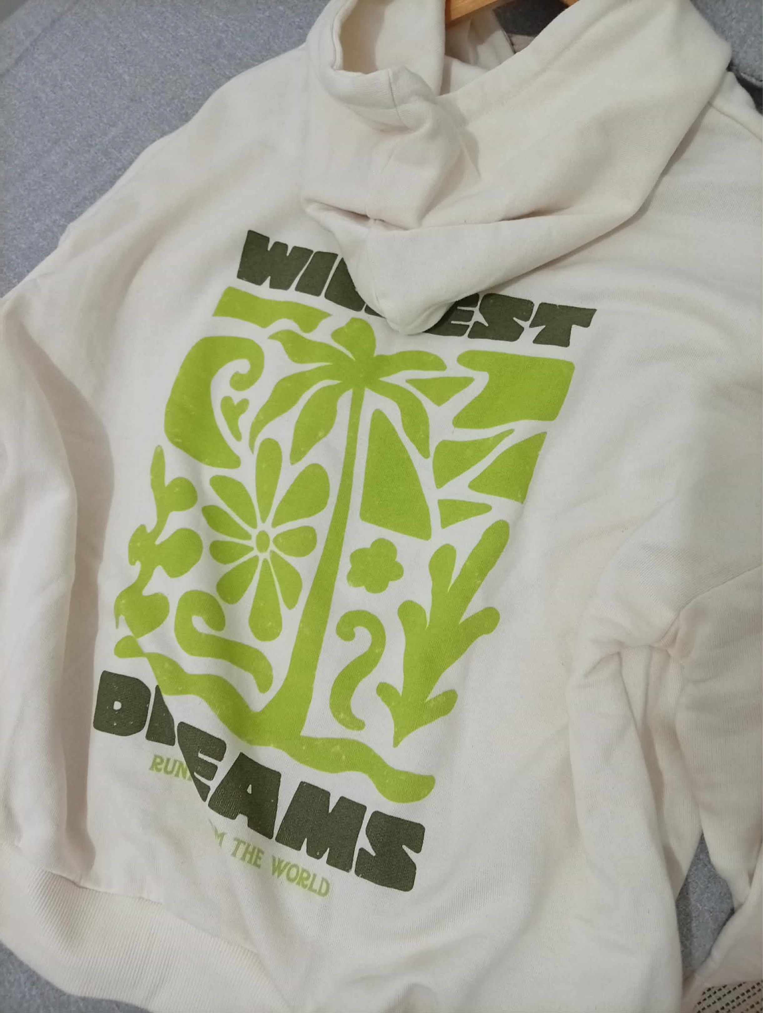 Pull&Bear Pacific Republic Hoodie (Category: Hoodies) located in Muntinlupa City. Submitted by giachristianina (Listing ID 1419923716, Image 3). Description: - Pull&Bear cream-colored hoodie - Features "Wildest Dreams" graphic (front and back) - Size: S/M - Drawstring hood - Kangaroo pocket - Made from soft fabric.