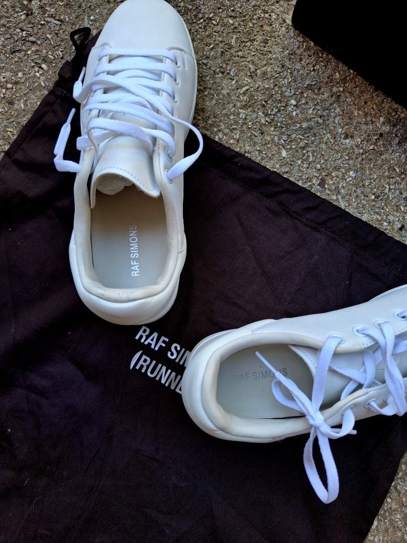 Raf Simons Runner Orion White Sneakers (Category: Sneakers) located in Manila. Submitted by fabby93 (Listing ID 1419945208, Image 2). Description: - White Raf Simons Runner Orion sneakers - Size: EU 41 - Includes original box - Includes dust bag - White laces - Unique sole design.