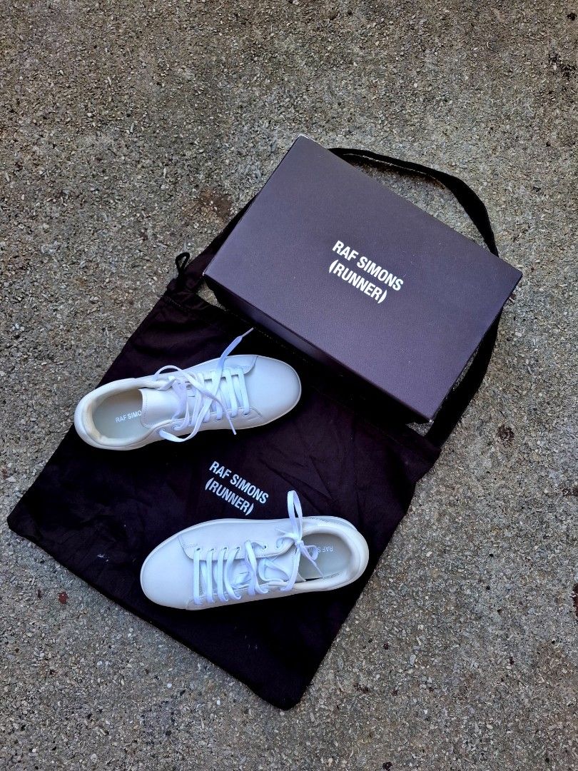 Raf Simons Runner Orion White Sneakers (Category: Sneakers) located in Manila. Submitted by fabby93 (Listing ID 1419945208, Image 1). Description: - White Raf Simons Runner Orion sneakers - Size: EU 41 - Includes original box - Includes dust bag - White laces - Unique sole design.