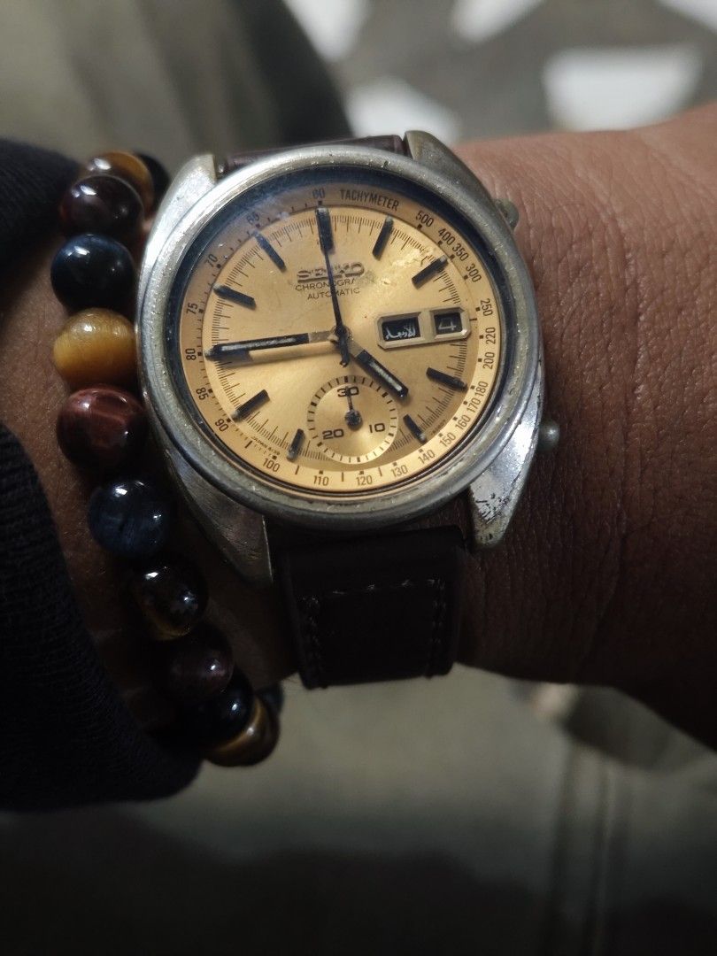 Seiko Chronograph Automatic Watch (Category: Men's Watches) located in Manila. Submitted by fdrakearon89191 (Listing ID 1419786111, Image 2). Description: - Vintage Seiko Chronograph Automatic watch - Gold-toned dial - Tachymeter bezel - Subdial - Brown leather strap - Date display at 3 o'clock -6319-.