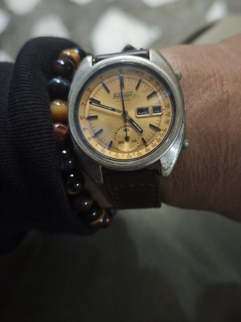 Seiko Chronograph Automatic Watch (Category: Men's Watches) located in Manila. Submitted by fdrakearon89191 (Listing ID 1419786111, Image 3). Description: - Vintage Seiko Chronograph Automatic watch - Gold-toned dial - Tachymeter bezel - Subdial - Brown leather strap - Date display at 3 o'clock -6319-.