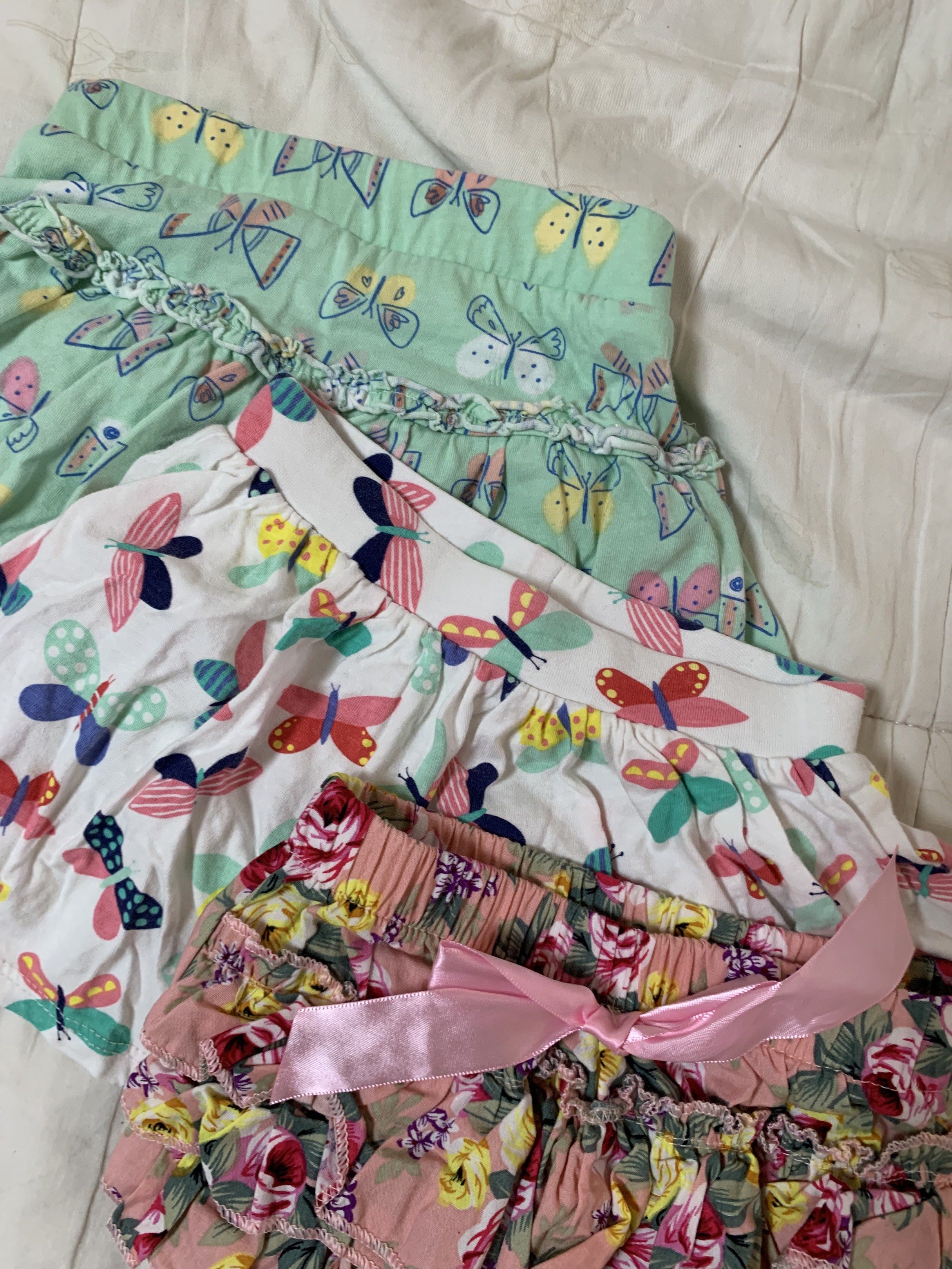 Skirt and Bloomer Bundle 12m 1 year old Bottom (Category: Babies & Kids Fashion) located in Santa Rosa. Submitted by Chichu123 (Listing ID 1419823382, Image 2). Description: - Cute baby skirts with butterfly and floral prints! - Includes: - Green skirt with butterfly prints - White skirt with butterfly prints (12 months) - Pink floral bloomers - Great addition to your baby's wardrobe!.