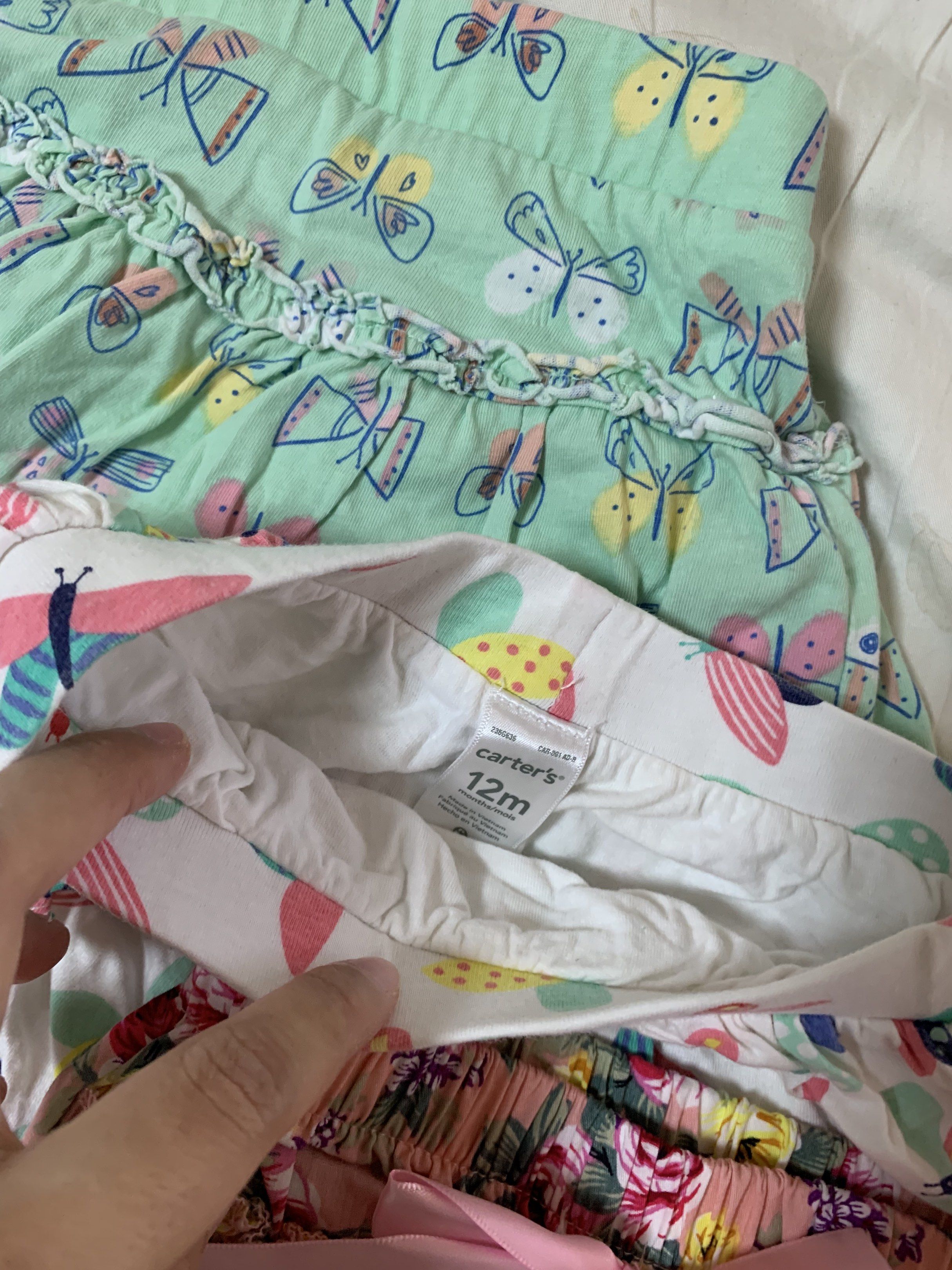 Skirt and Bloomer Bundle 12m 1 year old Bottom (Category: Babies & Kids Fashion) located in Santa Rosa. Submitted by Chichu123 (Listing ID 1419823382, Image 3). Description: - Cute baby skirts with butterfly and floral prints! - Includes: - Green skirt with butterfly prints - White skirt with butterfly prints (12 months) - Pink floral bloomers - Great addition to your baby's wardrobe!.