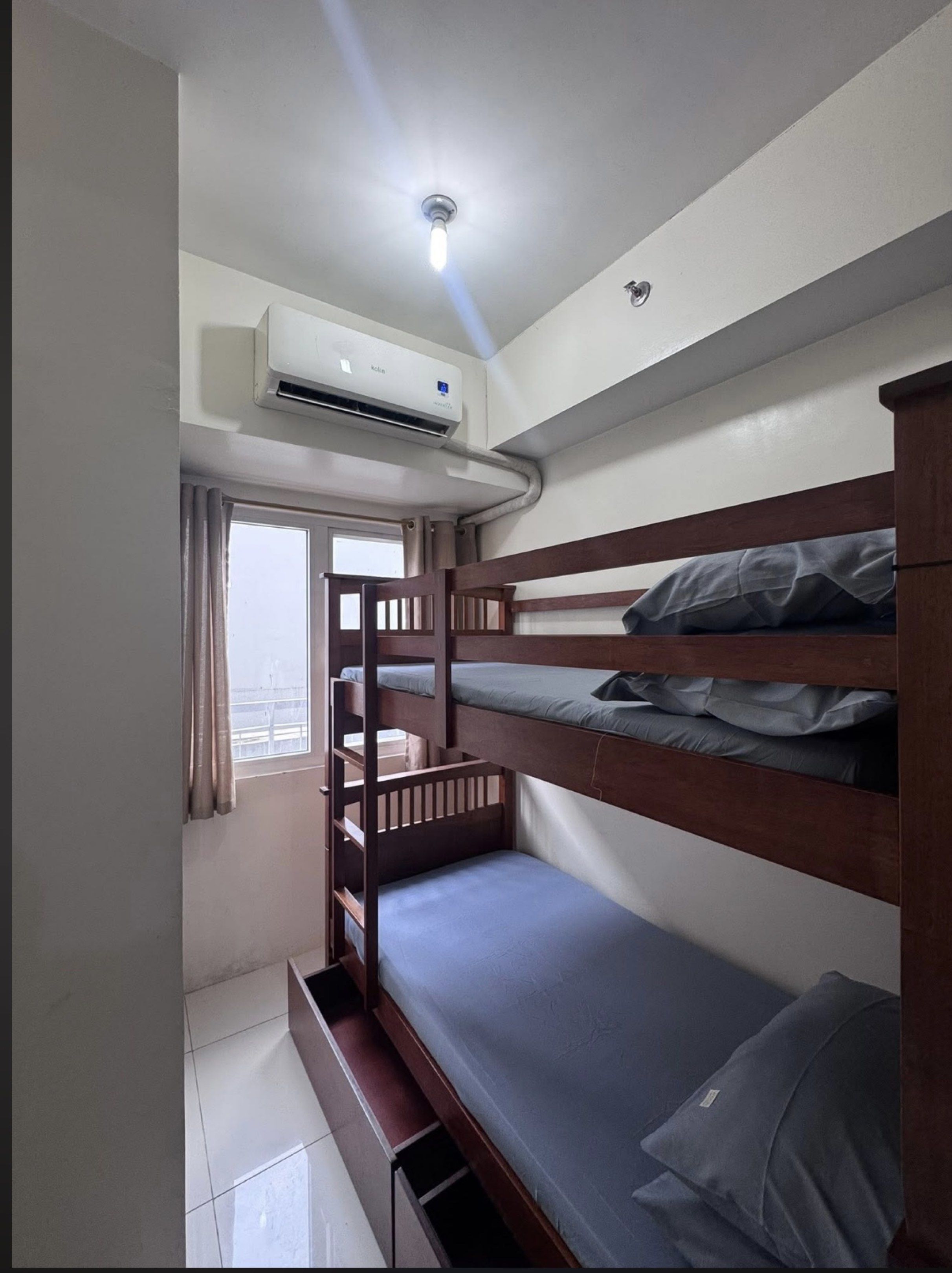 Studio For Rent Green Residences (Category: Apartments & Condos) located in Manila. Submitted by raspberry.tuti (Listing ID 1419899542, Image 2). Description: FOR RENT: Green Residences 📍 27th Floor | Ready for Move-In ✨ Unit Details: • Studio (16 sqm) • Can accommodate 2 pax • Double Deck • Aircon • Cr • Cabinet and Dining set (ordered will arrive next week) • Located on the 27th floor (low zone) • Ready for move-in • Viewing anytime 📚Amenitie