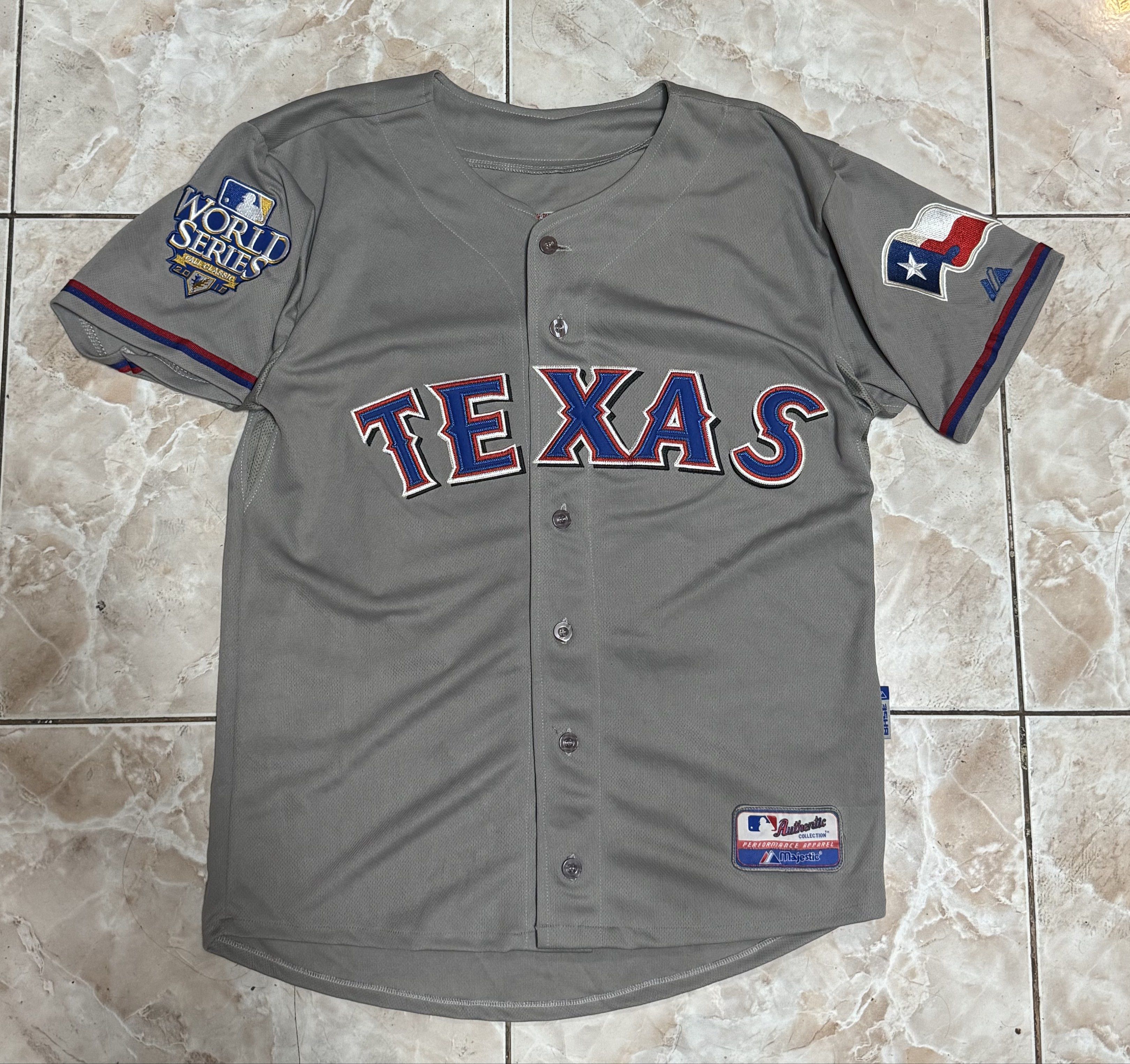 Texas Rangers Young #10 Baseball Jersey (Category: Activewear) located in Manila. Submitted by _dzmmm (Listing ID 1419782460, Image 1). Description: - Texas Rangers baseball jersey - Features "TEXAS" across the chest - "YOUNG 10" on the back - Includes World Series patch - Made by Majestic - Button-up front - Short sleeves Pm for more infos - Guaranteed Authentic - Condition 9/10 - Color rate 9/10 - No issues - Vintage.