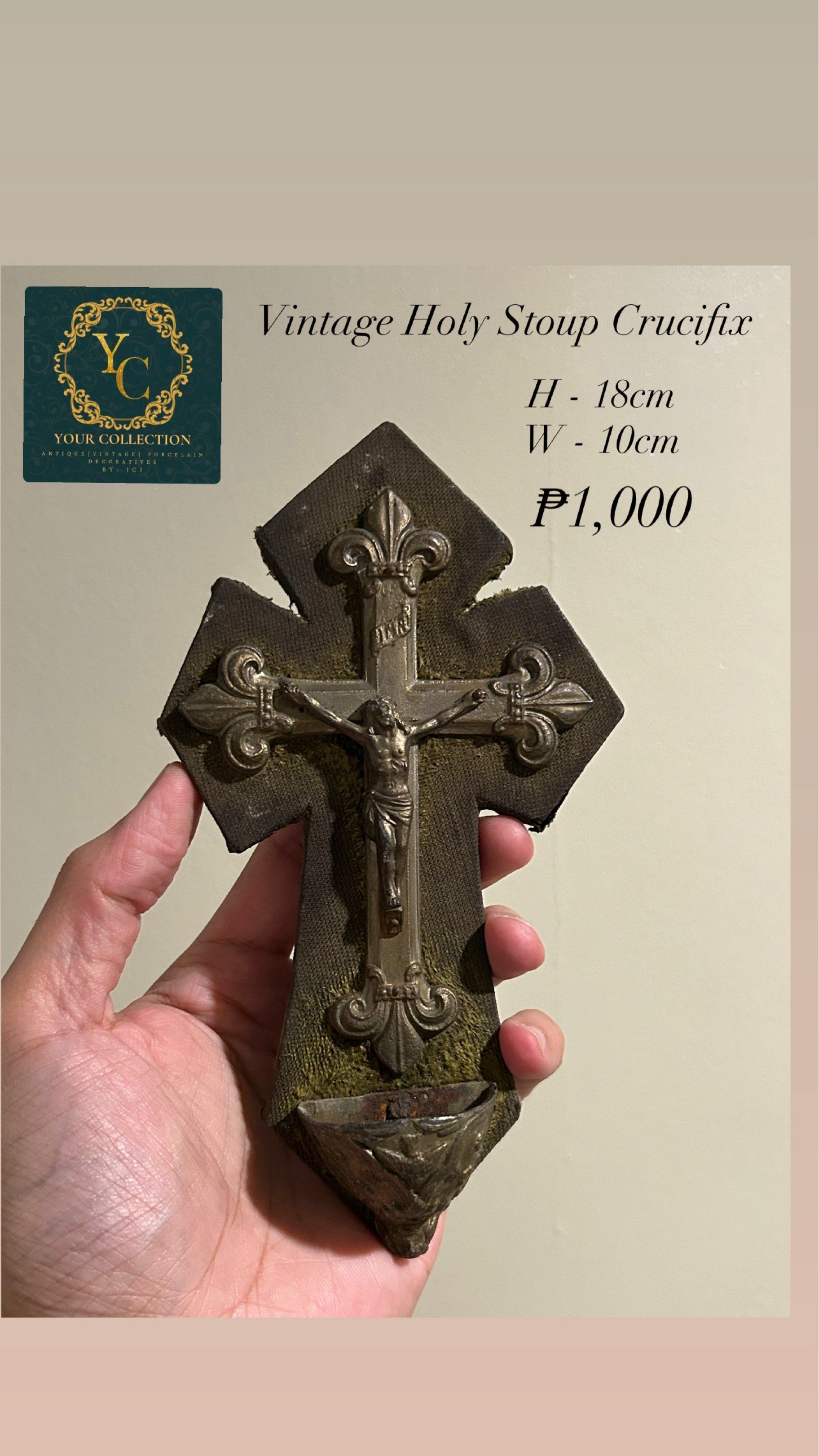 Vintage Holy Stoup Crucifix (Category: Religious Items) located in Bulacan. Submitted by YourCollection (Listing ID 1419965068, Image 1). Description: - Vintage Holy Stoup Crucifix - Features a crucifix with Jesus Christ - Includes a holy water font - Decorative design with fleur-de-lis accents - Dimensions: Approximately 18cm (H) x 10cm (W) - Includes a hanging loop.