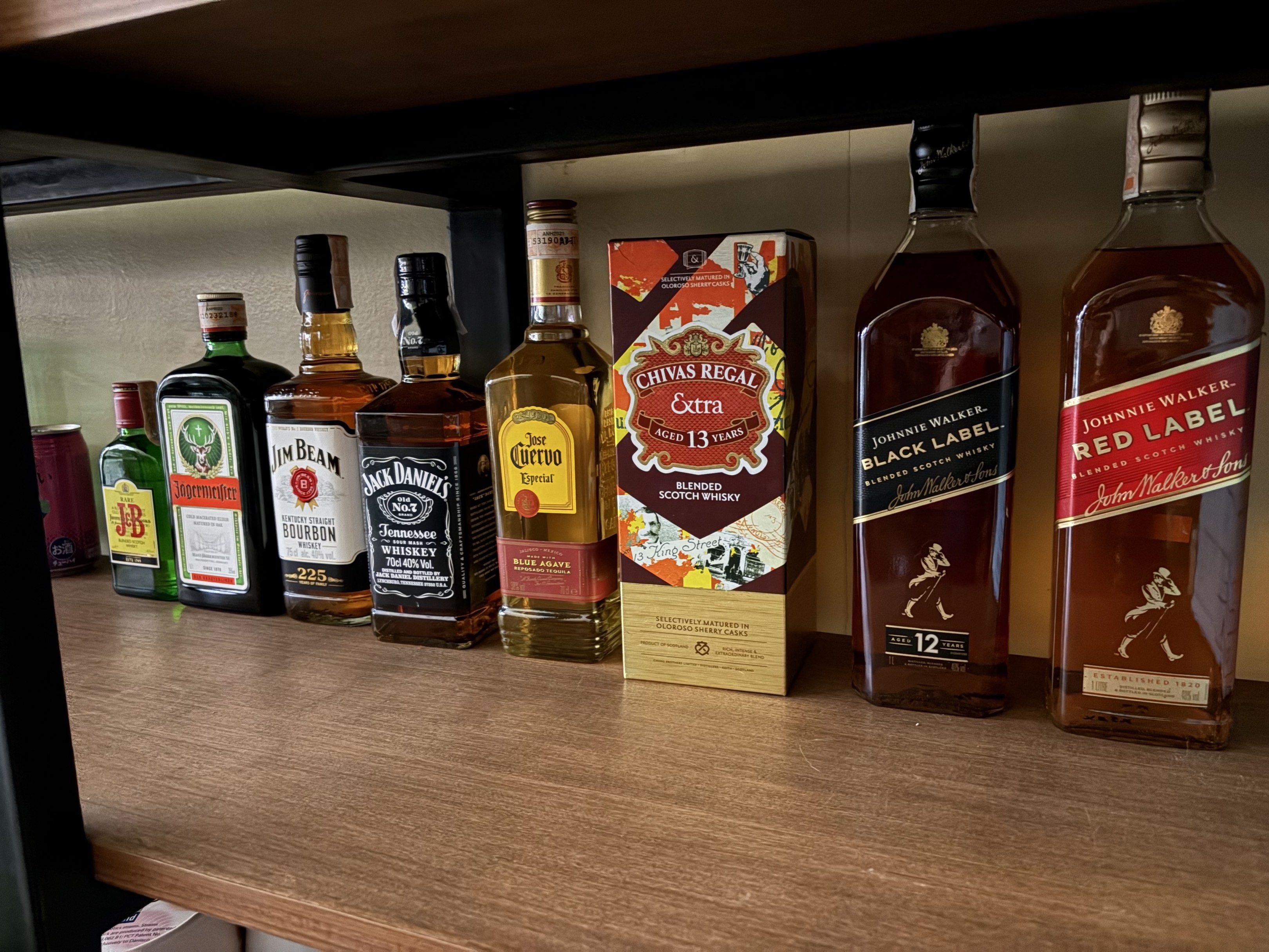 Whiskey and Tequila Assortment (Category: Beverages) located in Manila. Submitted by violet1966 (Listing ID 1419843779, Image 1). Description: Collection of various liquor bottles including Jack Daniel's, Jim Beam, Jose Cuervo, Chivas Regal, Johnnie Walker Black Label, and Johnnie Walker Red Label. Also includes a bottle of Jagermeister. Perfect for a home bar or as a gift for a liquor enthusiast. JimBeam +small- 1000 Jäegermeister-900 Jack Danie