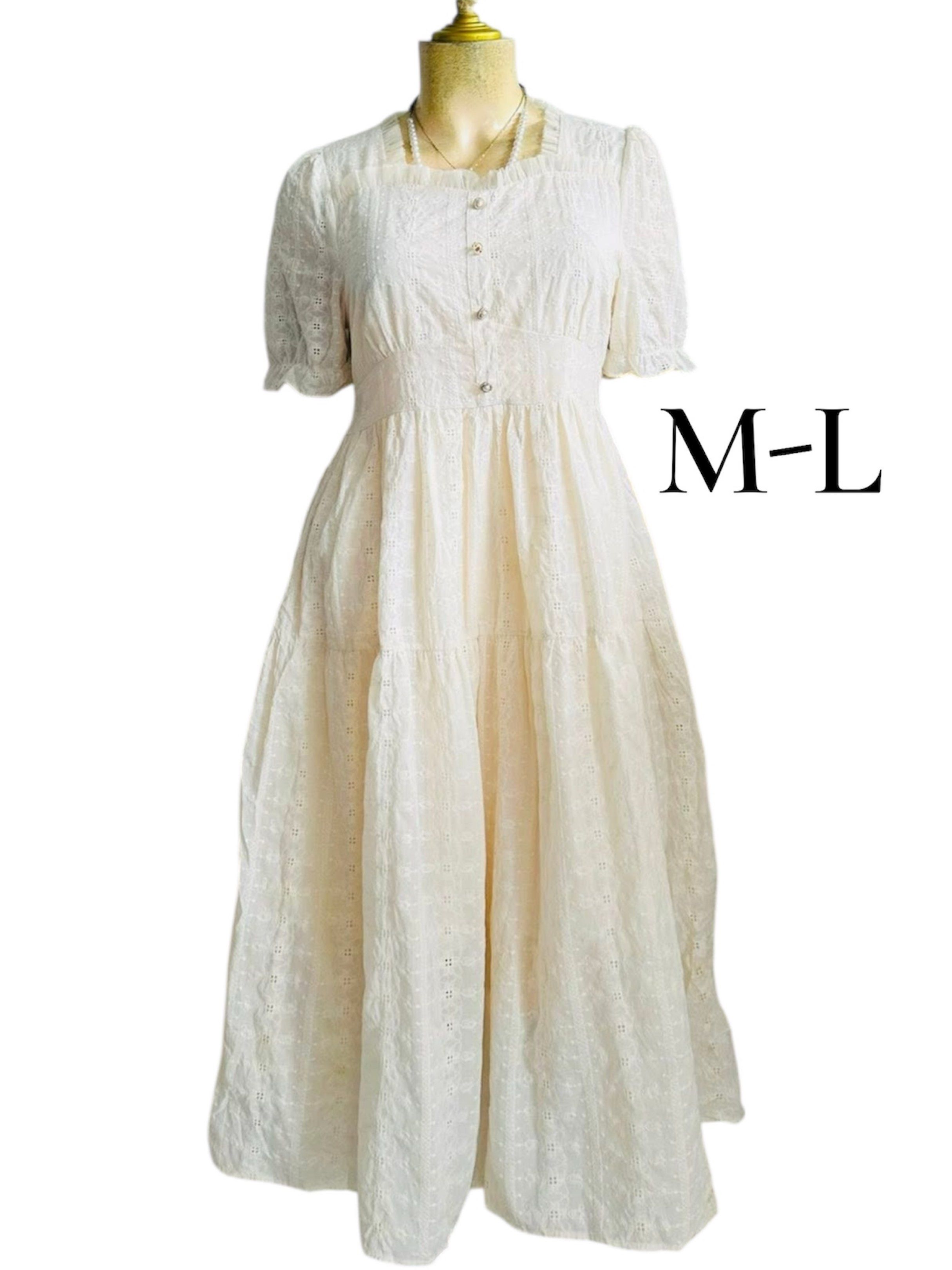 White Embroidered Midi Dress M-L (Category: Dresses) located in Daraga. Submitted by rrcollection34 (Listing ID 1419930504, Image 1). Description: - color cream midi dress length 43 - Intricate embroidery cotton fabric with lining - Square neckline - Button-down front not working - Short puff sleeves - Fitted bodice - Tiered skirt - Size M-L.