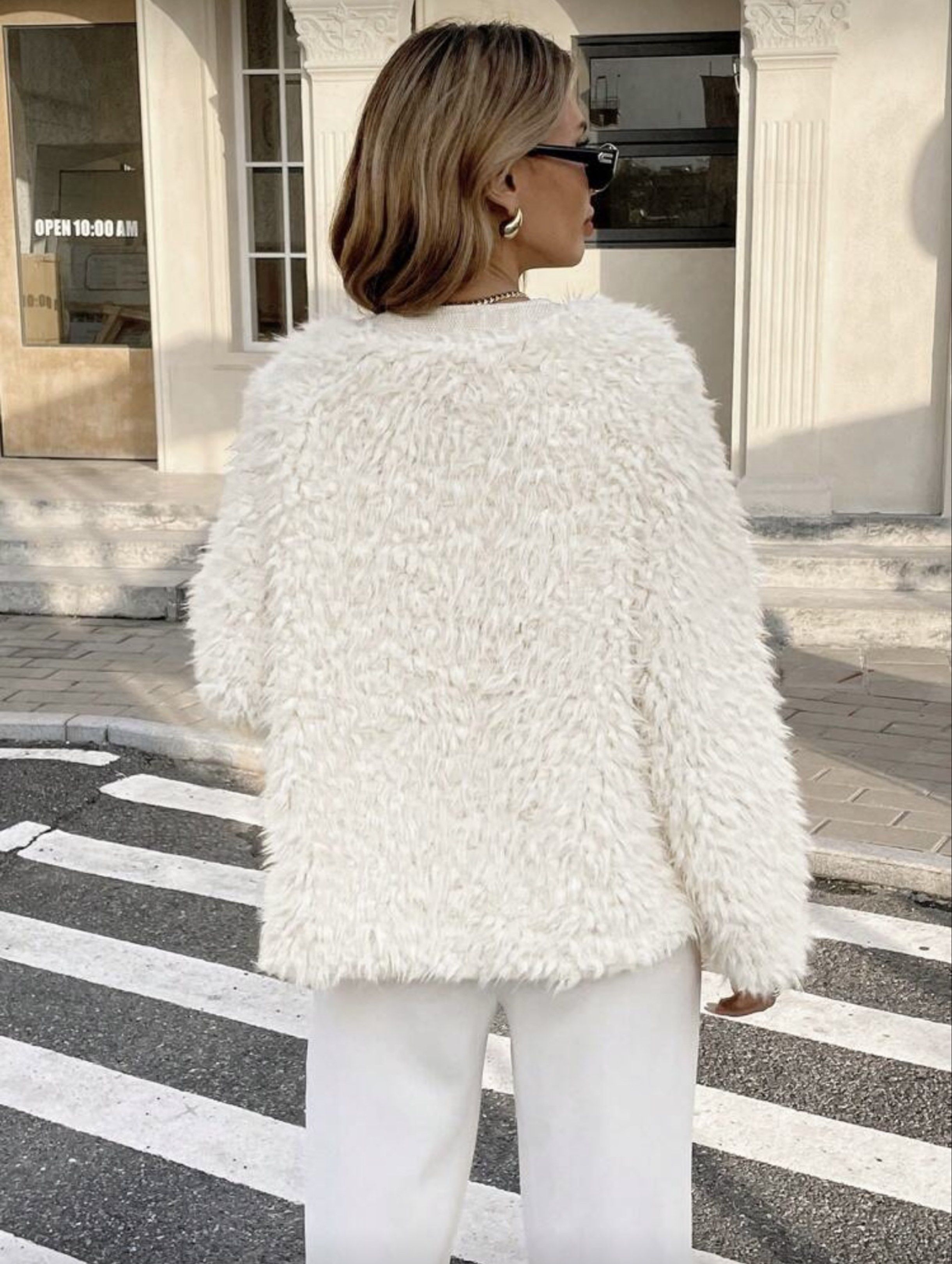 White Faux Fur Jacket (Category: Coats, Jackets and Outerwear) located in Valenzuela. Submitted by kimerunn (Listing ID 1419854645, Image 2). Description: - White faux fur jacket - Round neckline - Pearl button closure - Two front pockets with tweed detailing - Soft, textured feel - Great for layering - Suitable for various occasions.