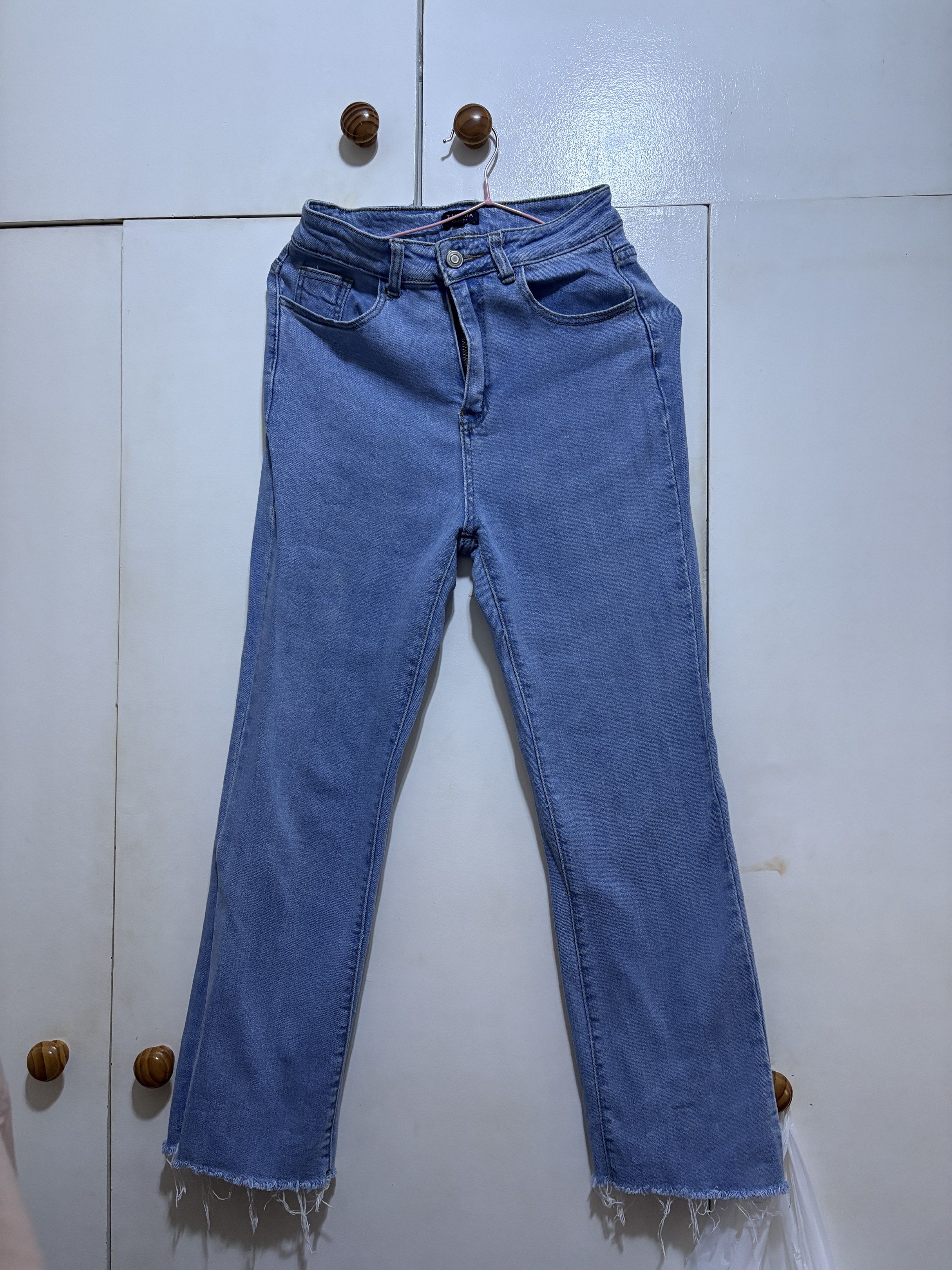 Zalora Basics Light Wash Jeans - Size S (Category: Jeans) located in Manila. Submitted by belleshoppe_ (Listing ID 1419877037, Image 1). Description: - Zalora Basics light wash jeans - High-waisted - Straight leg with raw hem - Size S - Material: 65% cotton, 33% polyester, 2% elastane - Button and zipper closure.