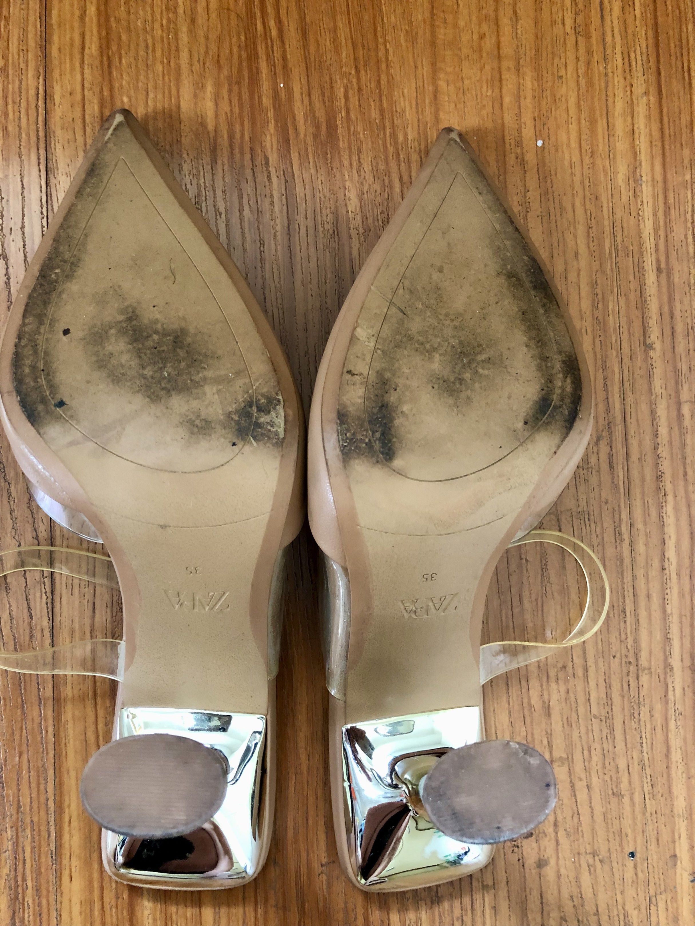 Zara Vinyl High-Heel Mules (Category: Heels) located in Quezon City. Submitted by ayetb (Listing ID 1419843855, Image 3). Description: Zara Vinyl High-Heel Mules Selling price: ₱520 Purchased from Zara store at ₱2,795 Condition: Pre-loved. The clear heel shows signs of wear, including visible scratches and some discoloration/oxidation inside the heel. Upper and sole are still usable, but please manage expectations. Reason for selling: Declutterin