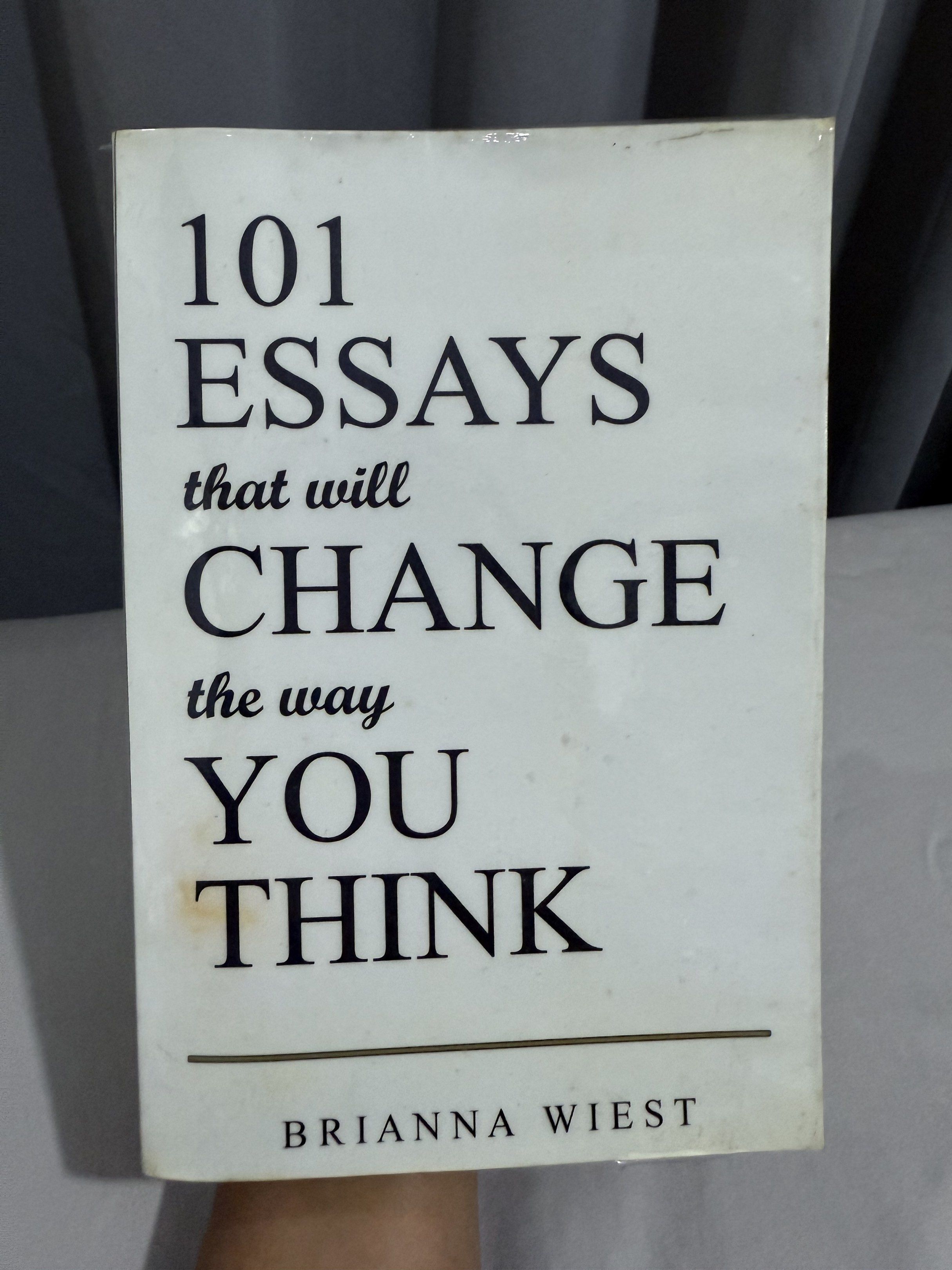 101 Essays That Will Change The Way You Think by Brianna Wiest (Category: Textbooks) located in Mansalay. Submitted by declutterandco (Listing ID 1420114250, Image 1). Description: - Title: 101 Essays That Will Change The Way You Think - Author: Brianna Wiest - Format: Paperback - Cover: White with black text - Content: Features 101 essays aimed at changing your perspective..
