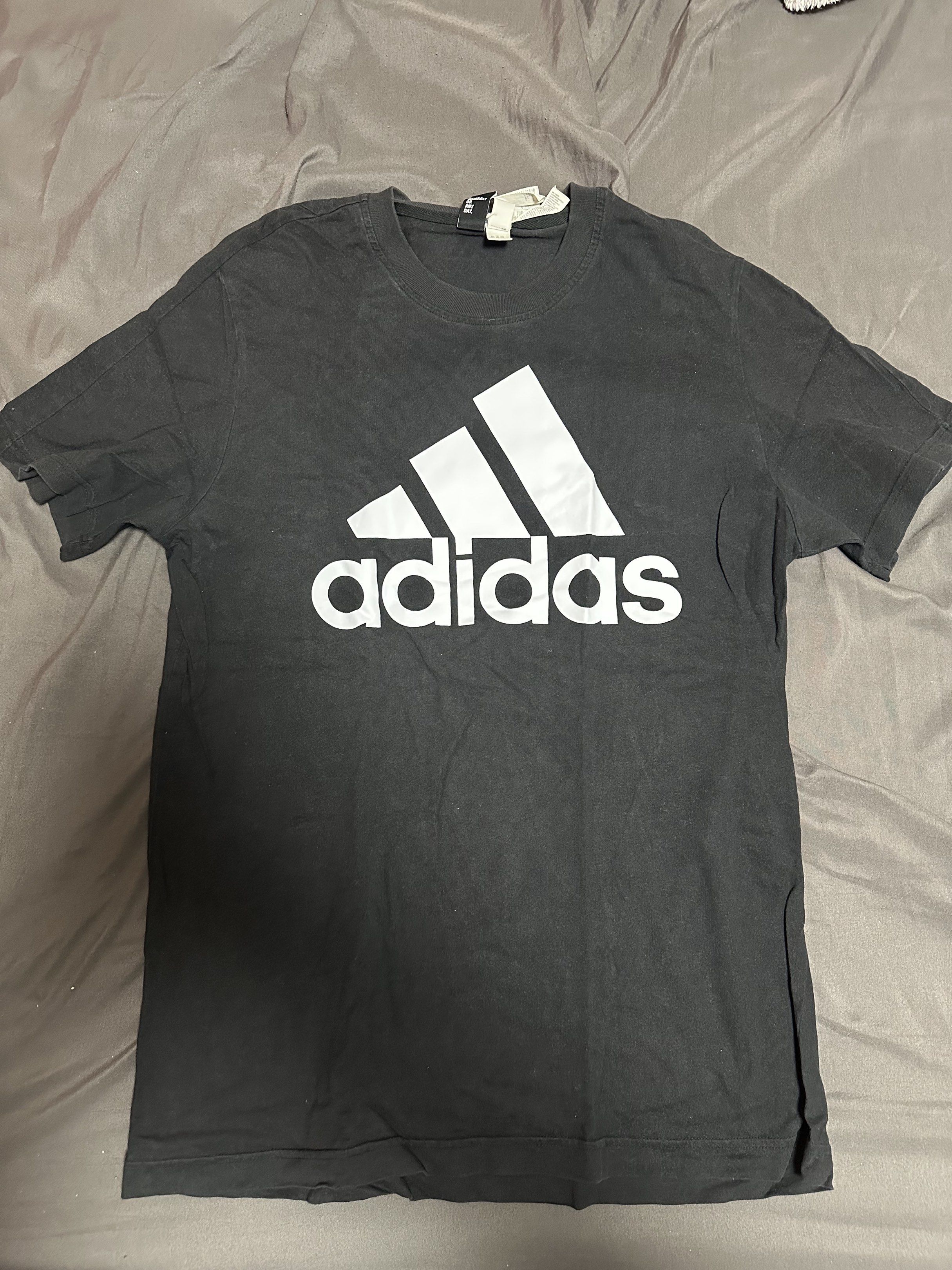 Adidas Black T-Shirt (Category: Tshirts & Polo Shirts ) located in Paranaque City. Submitted by lancedleon (Listing ID 1419998945, Image 1). Description: Black Adidas Shirt, Medium size - Black Adidas t-shirt - White Adidas logo on front - Crew neck - Short sleeves - Soft fabric.