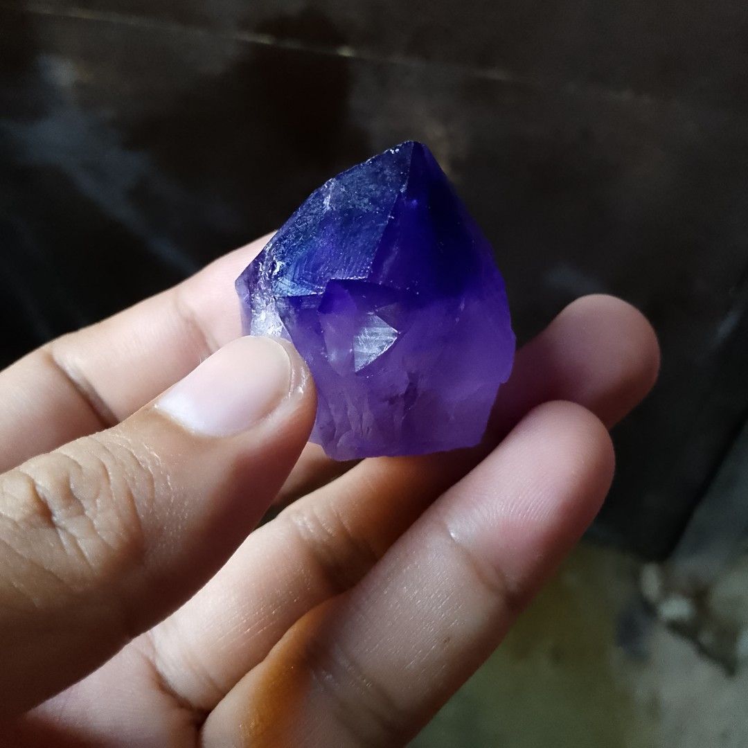 Amethyst Crystal Point (Category: Other Home Decor) located in Manila. Submitted by arn_thrifts (Listing ID 1420031022, Image 3). Description: - Genuine amethyst crystal point - Rich, deep purple hue with lighter variations - Natural, uncut crystal - Pointed top - Displays a lovely shine - Well-formed crystal.