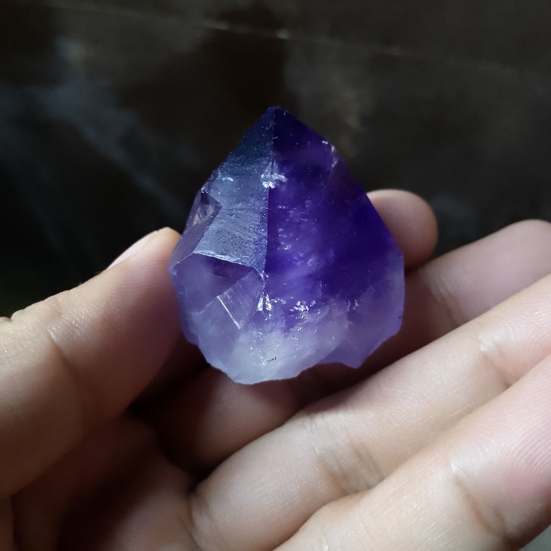 Amethyst Crystal Point (Category: Other Home Decor) located in Manila. Submitted by arn_thrifts (Listing ID 1420031022, Image 1). Description: - Genuine amethyst crystal point - Rich, deep purple hue with lighter variations - Natural, uncut crystal - Pointed top - Displays a lovely shine - Well-formed crystal.