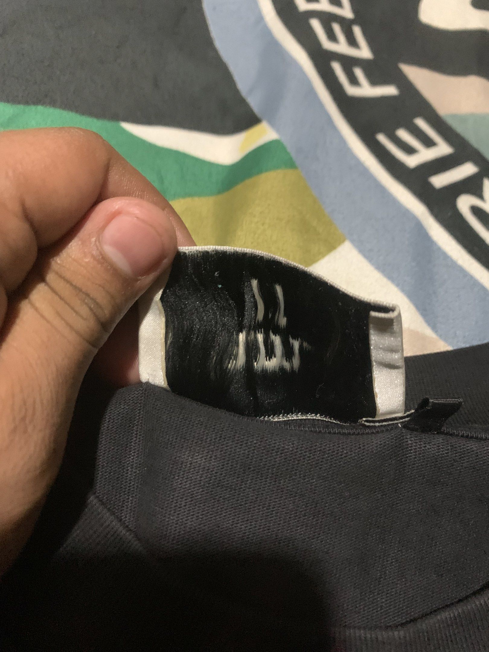 AMI Paris Black T-shirt XL (Category: Luxury Apparel) located in Cagayan de Oro. Submitted by agboysalis60090 (Listing ID 1420139585, Image 3). Description: Black AMI Paris T-shirt. Features the AMI de Coeur logo on the chest. The size is XL. The tag is visible..