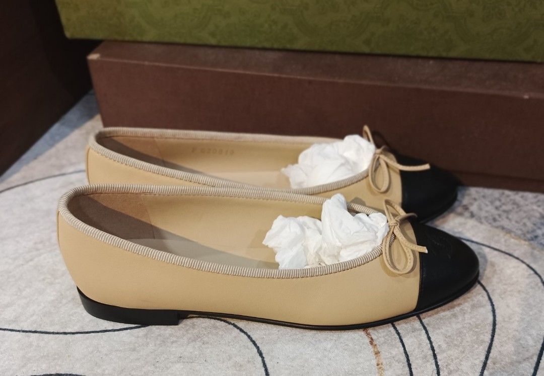 Authentic Chanel Ballet Flats (Category: Flats & Sandals) located in Itogon. Submitted by designerluxeshop (Listing ID 1420079932, Image 2). Description: Pre-owned Chanel Ballet two tone flats with authenticity document, dustbag and box size 38, 💯% original,in good condition, shipping is free, message me if interested, delivery is by schedule discount is offered for cash buyer layaway is accepted 20% downpayment 80% balance payable up to 4-6mont
