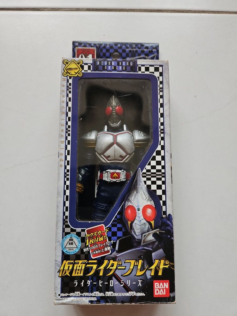Bandai Masked Rider Blade Action Figure (Category: Toy Figures) located in Singapore. Submitted by ddtong (Listing ID 1419983879, Image 1). Description: Authentic Bandai Masked Rider Blade action figure, still in its original packaging. A great collectible item for fans of the series..