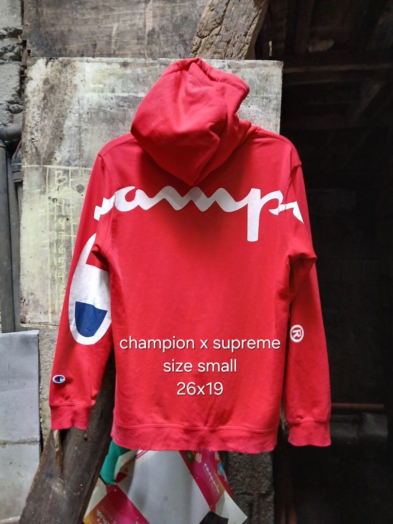 Champion x Supreme Hoodie - Red - Small (Category: Hoodies) located in Quezon City. Submitted by lundthrift02 (Listing ID 1420004985, Image 2). Description: - Red Champion x Supreme hoodie - Size: Small - Features: - Front pocket - Champion logo patch - Large Champion logo on back - Champion logo on left sleeve - Measurements: 26x19 - 1000php - Quezon City Loc .