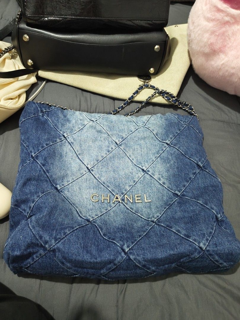 Chanel Denim Quilted Chain Bag (Category: Luxury Bags & Wallets) located in Manila. Submitted by coolstorm_111b23 (Listing ID 1420098605, Image 1). Description: - Authentic Chanel handbag - Quilted denim design - Stylish chain strap - Secure top zipper closure - Interior pocket for essentials - Iconic Chanel logo - Tote style.